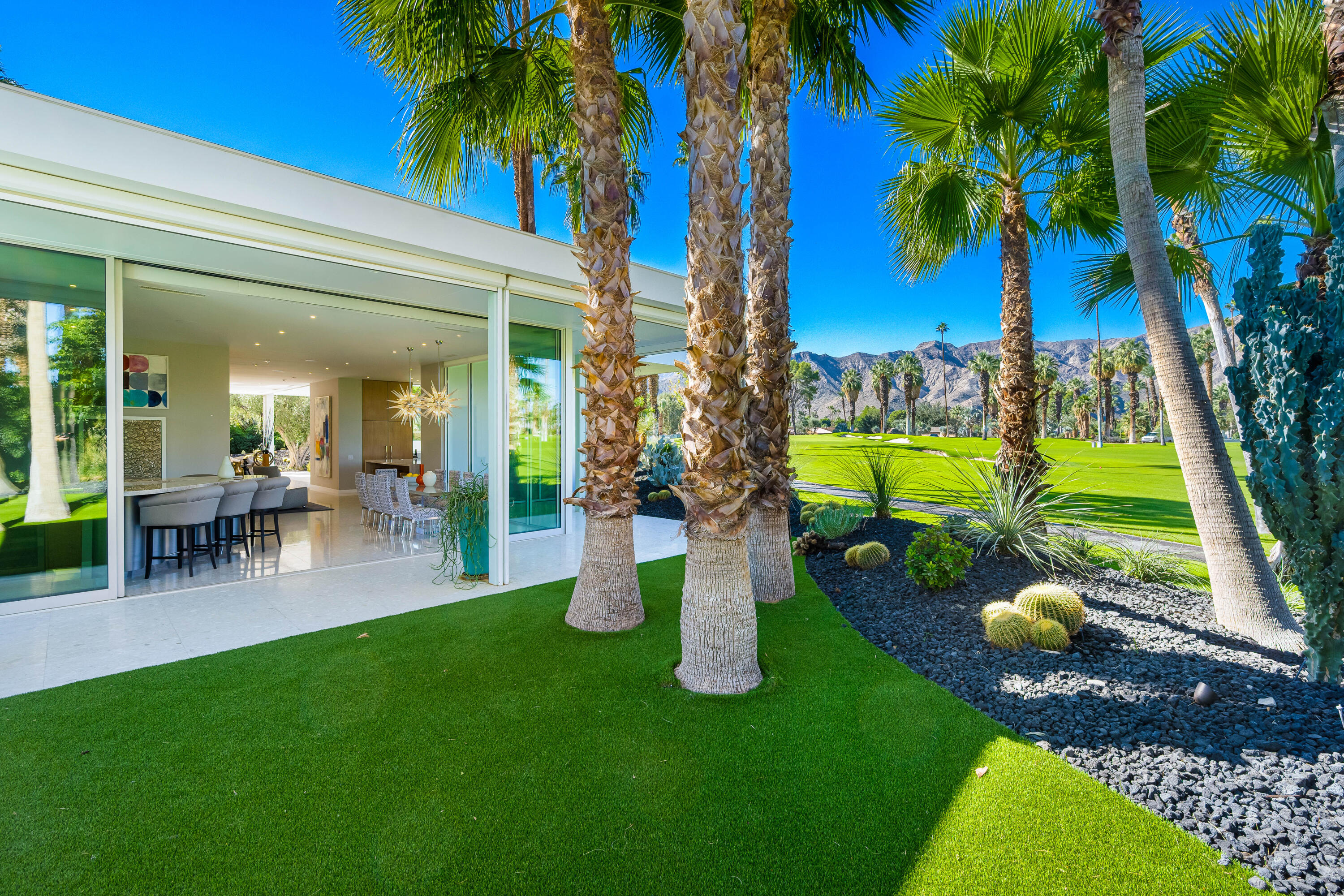 40365 Sand Dune Road Rancho Mirage, CA 92270 - Photo 48 of 70 a view of a backyard with swimming pool and sitting area