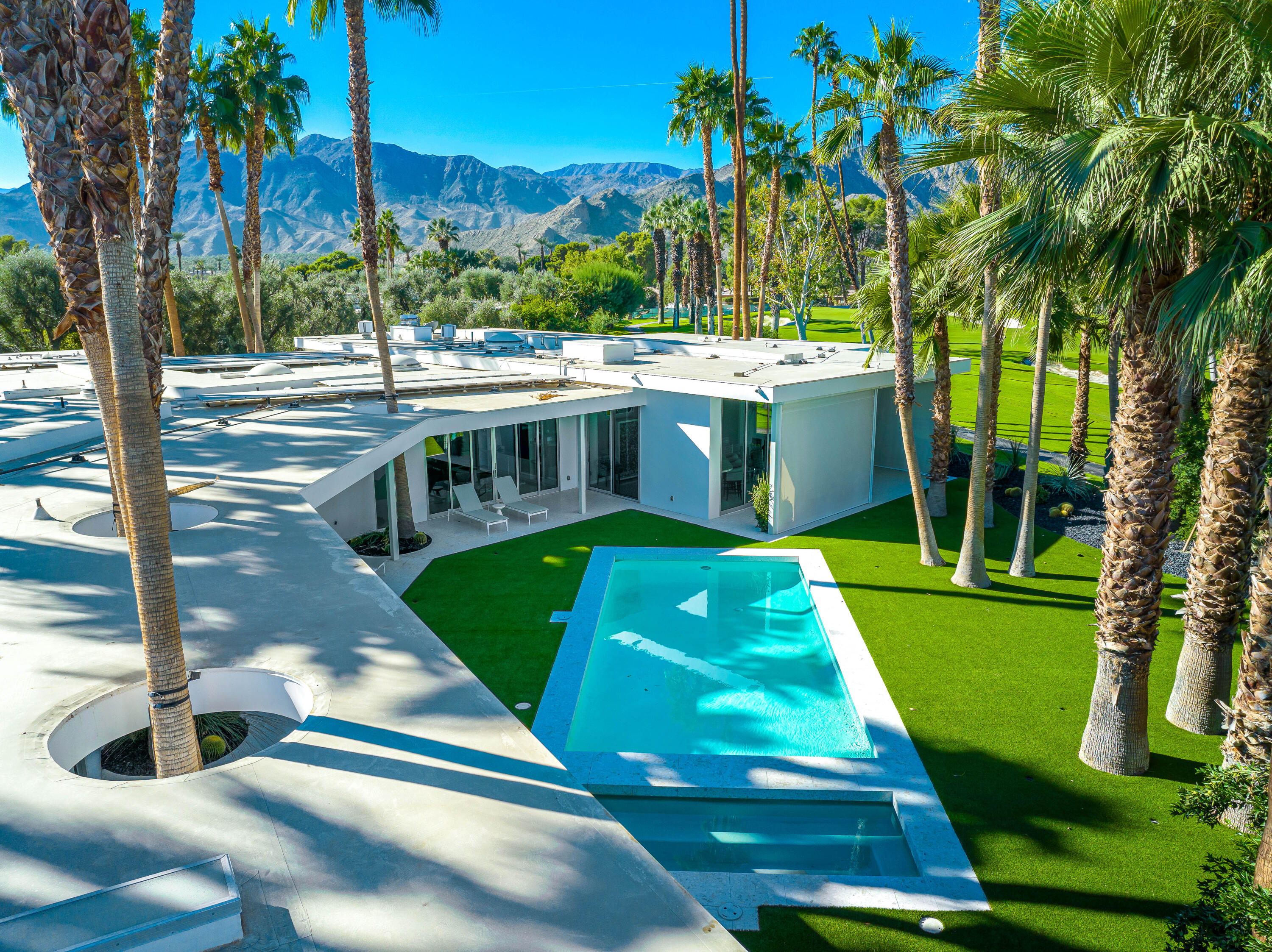 40365 Sand Dune Road Rancho Mirage, CA 92270 - Photo 5 of 70 a view of a swimming pool with a yard