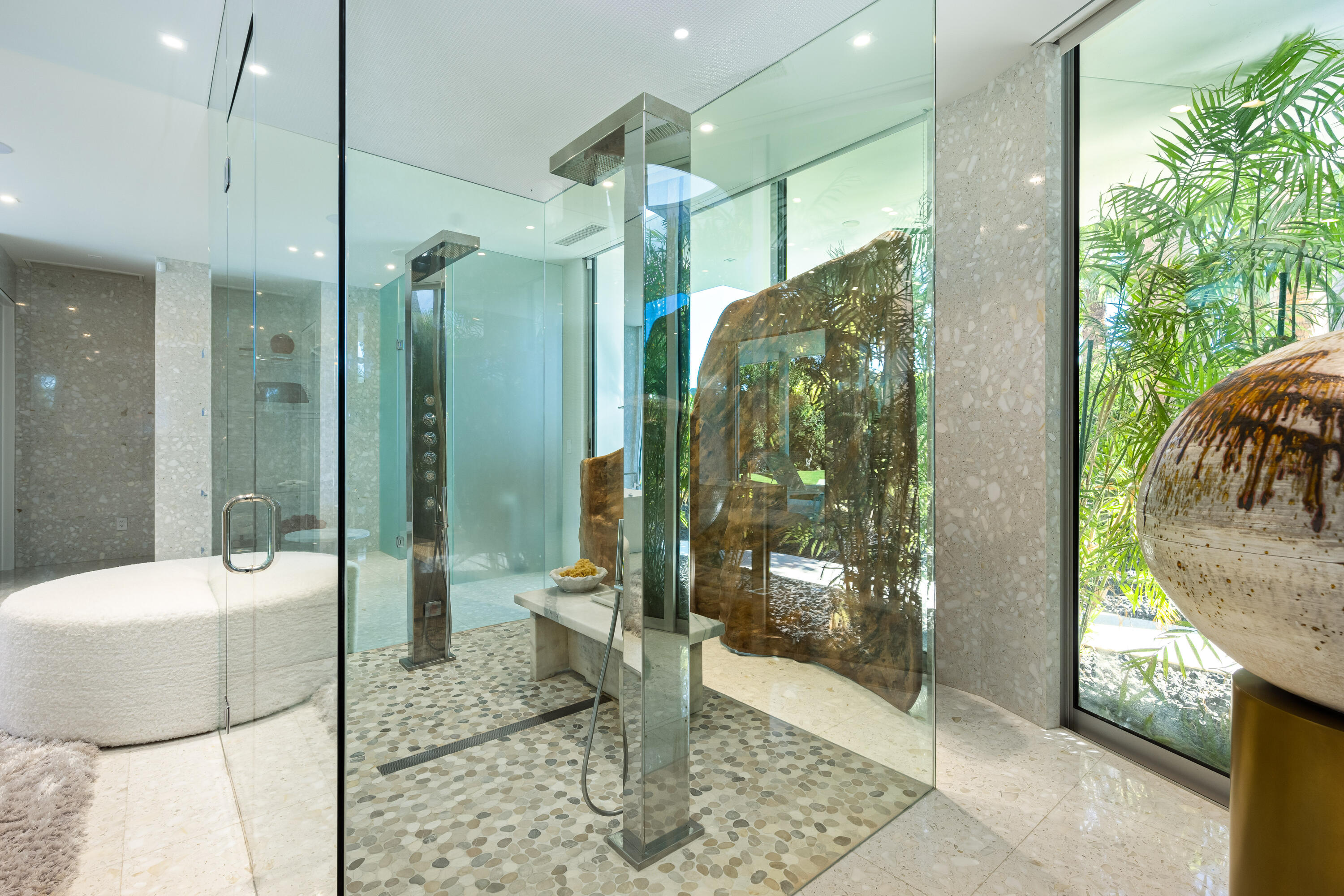 40365 Sand Dune Road Rancho Mirage, CA 92270 - Photo 52 of 70 a bathroom with a glass shower door and a glass door