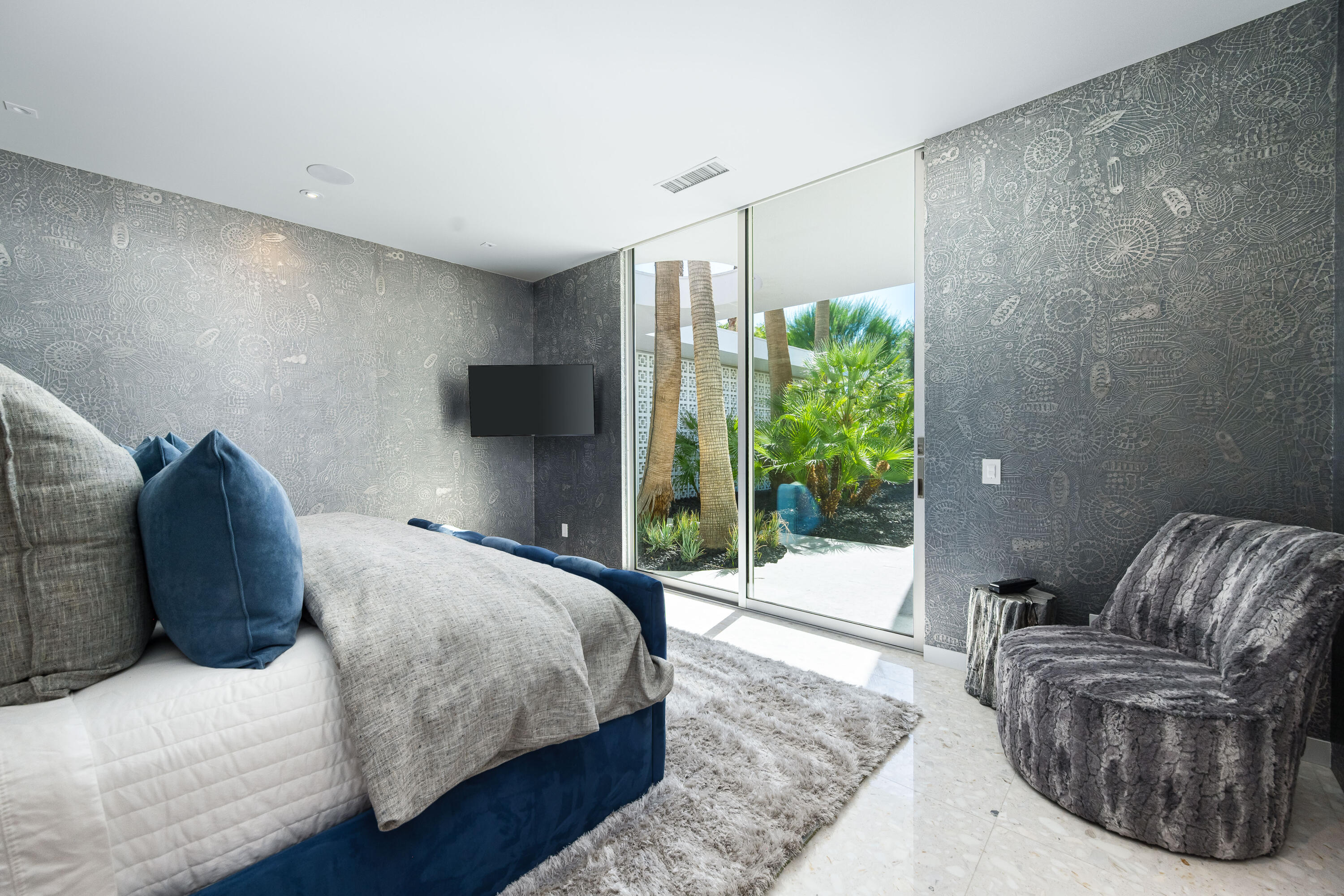 40365 Sand Dune Road Rancho Mirage, CA 92270 - Photo 60 of 70 a bedroom with a bed and a couch