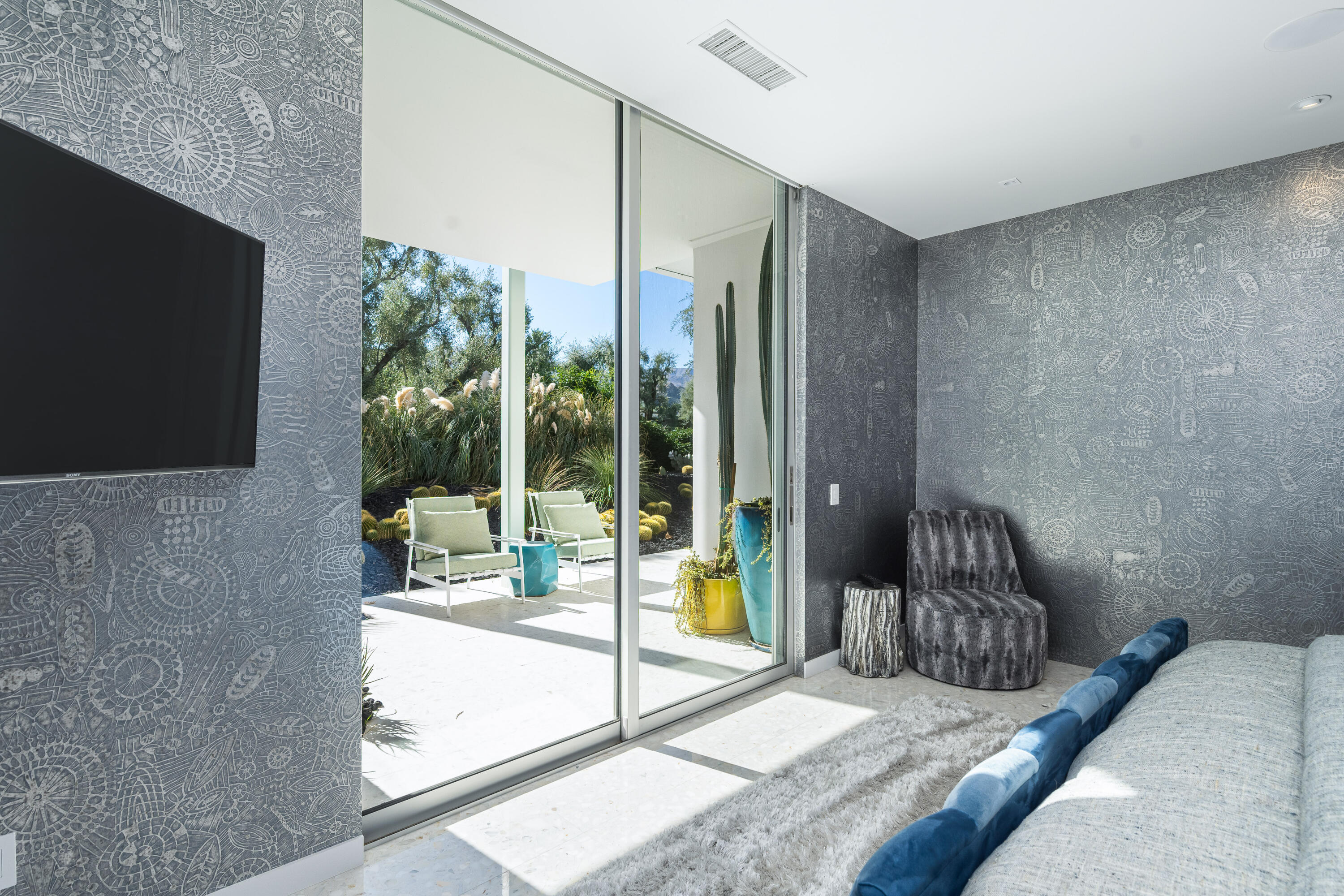 40365 Sand Dune Road Rancho Mirage, CA 92270 - Photo 61 of 70 a bedroom with a bed a flat screen tv and a faucet