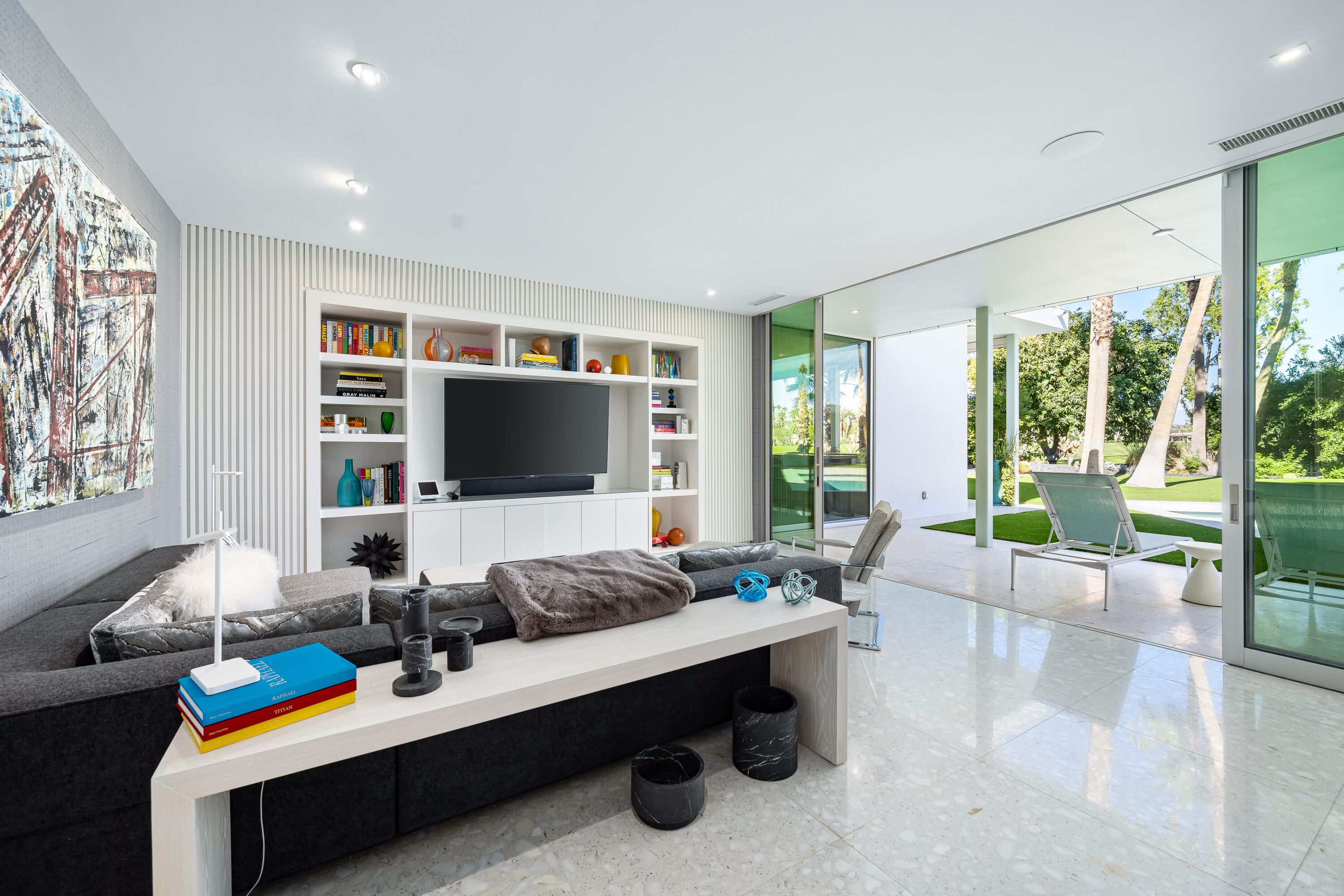 40365 Sand Dune Road Rancho Mirage, CA 92270 - Photo 63 of 70 a living room with furniture a flat screen tv and a large window