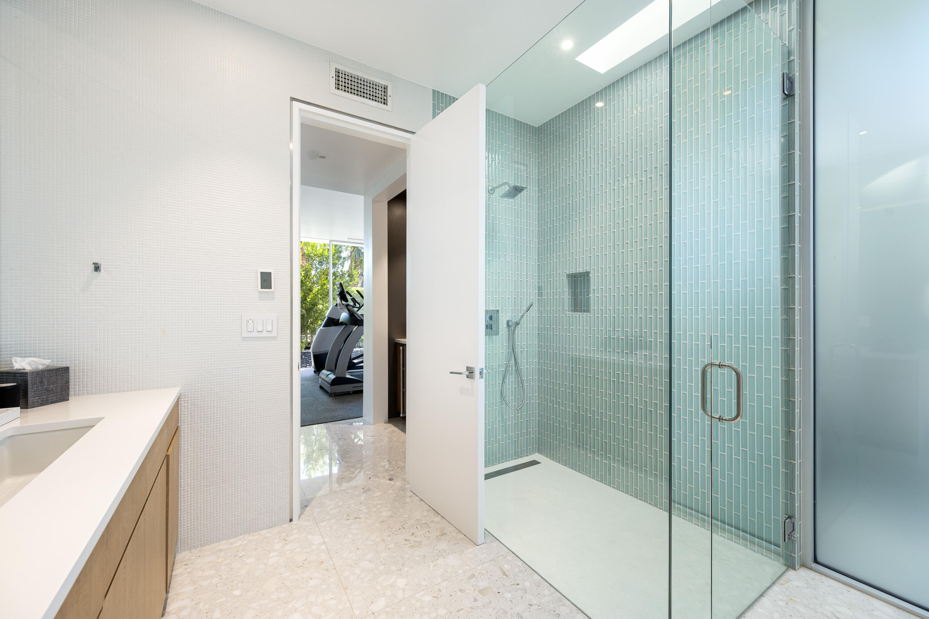 40365 Sand Dune Road Rancho Mirage, CA 92270 - Photo 68 of 70 a bathroom with a shower and a sink