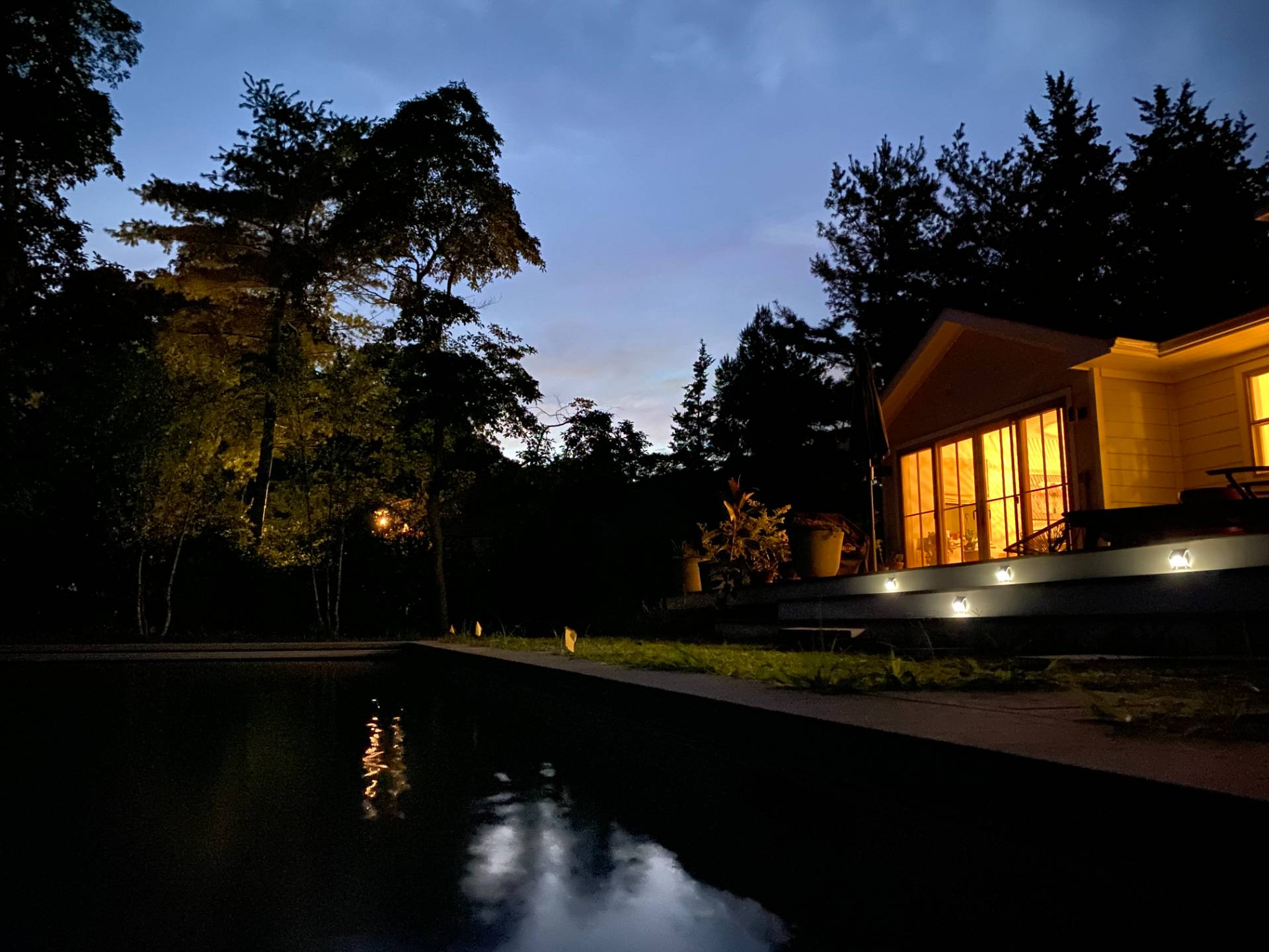 264 Kings Point Road East Hampton, NY 11937 - Photo 25 of 30 a view of a house in the middle of a yard and green space