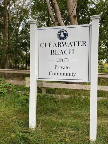 a sign broad on the side of the road