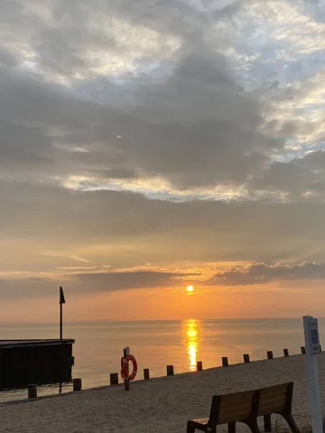 a view of a ocean and beach