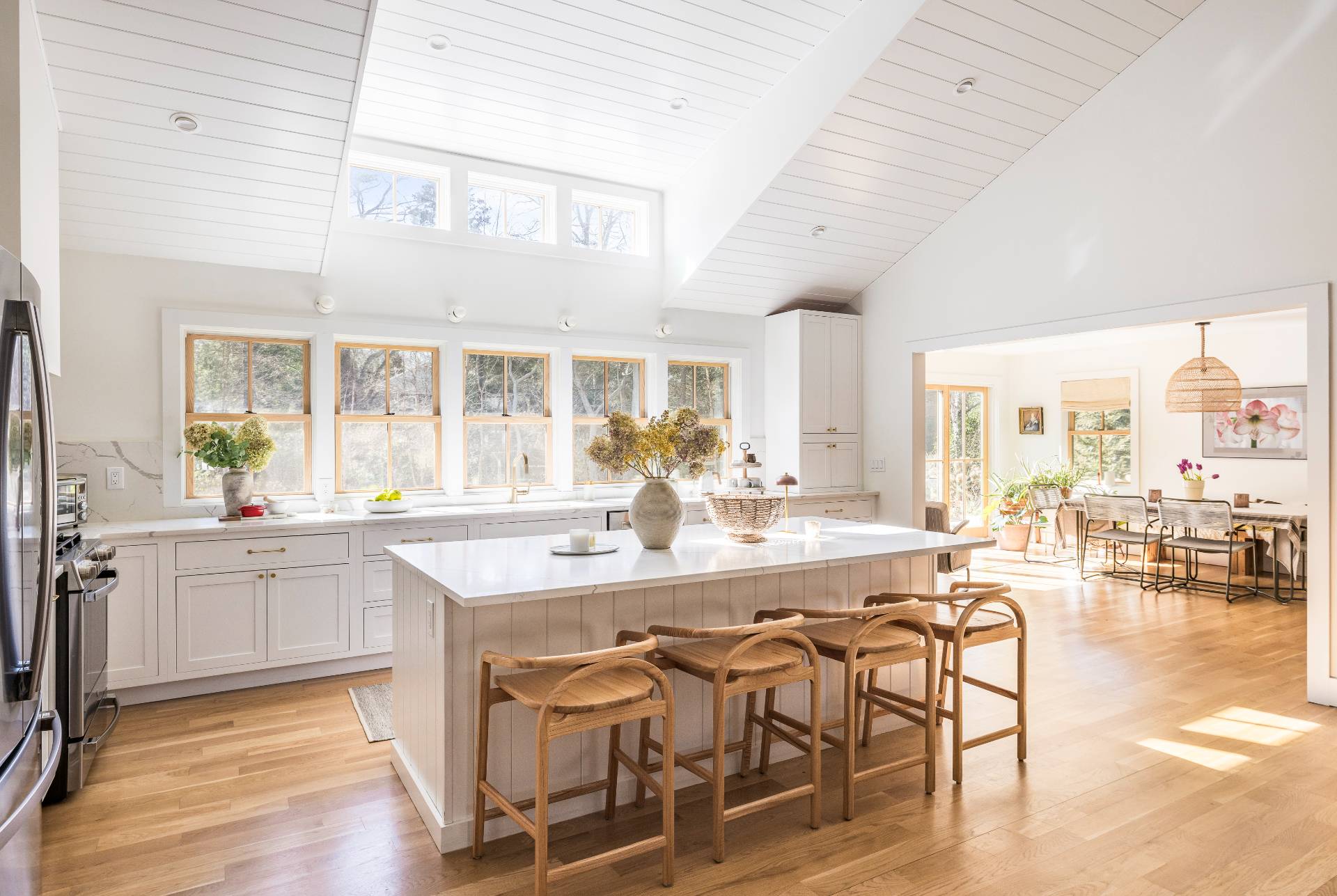 264 Kings Point Road East Hampton, NY 11937 - Photo 3 of 30 a view of a dining room with furniture and wooden floor