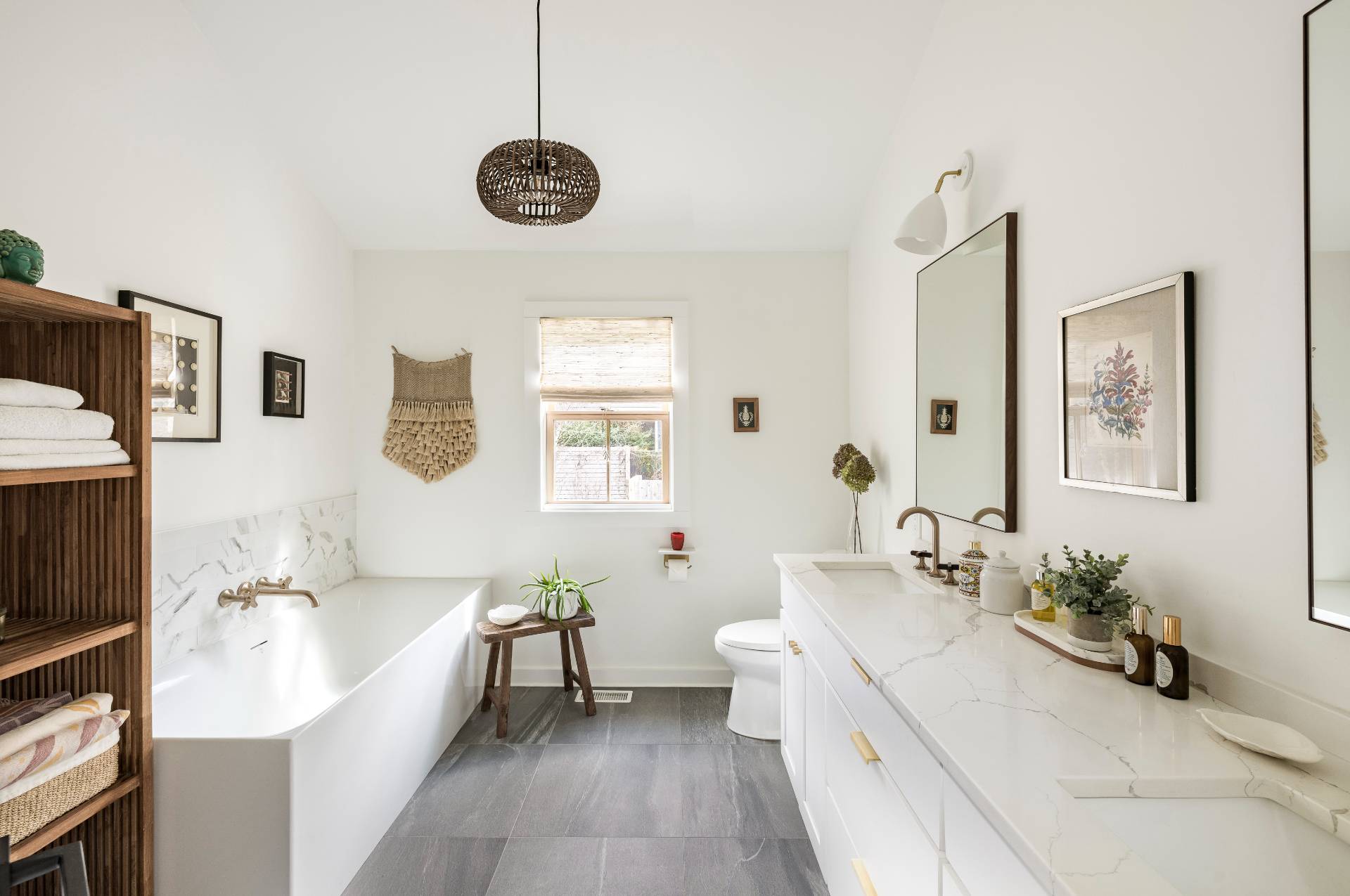 264 Kings Point Road East Hampton, NY 11937 - Photo 9 of 30 a spacious bathroom with a tub sink and a mirror