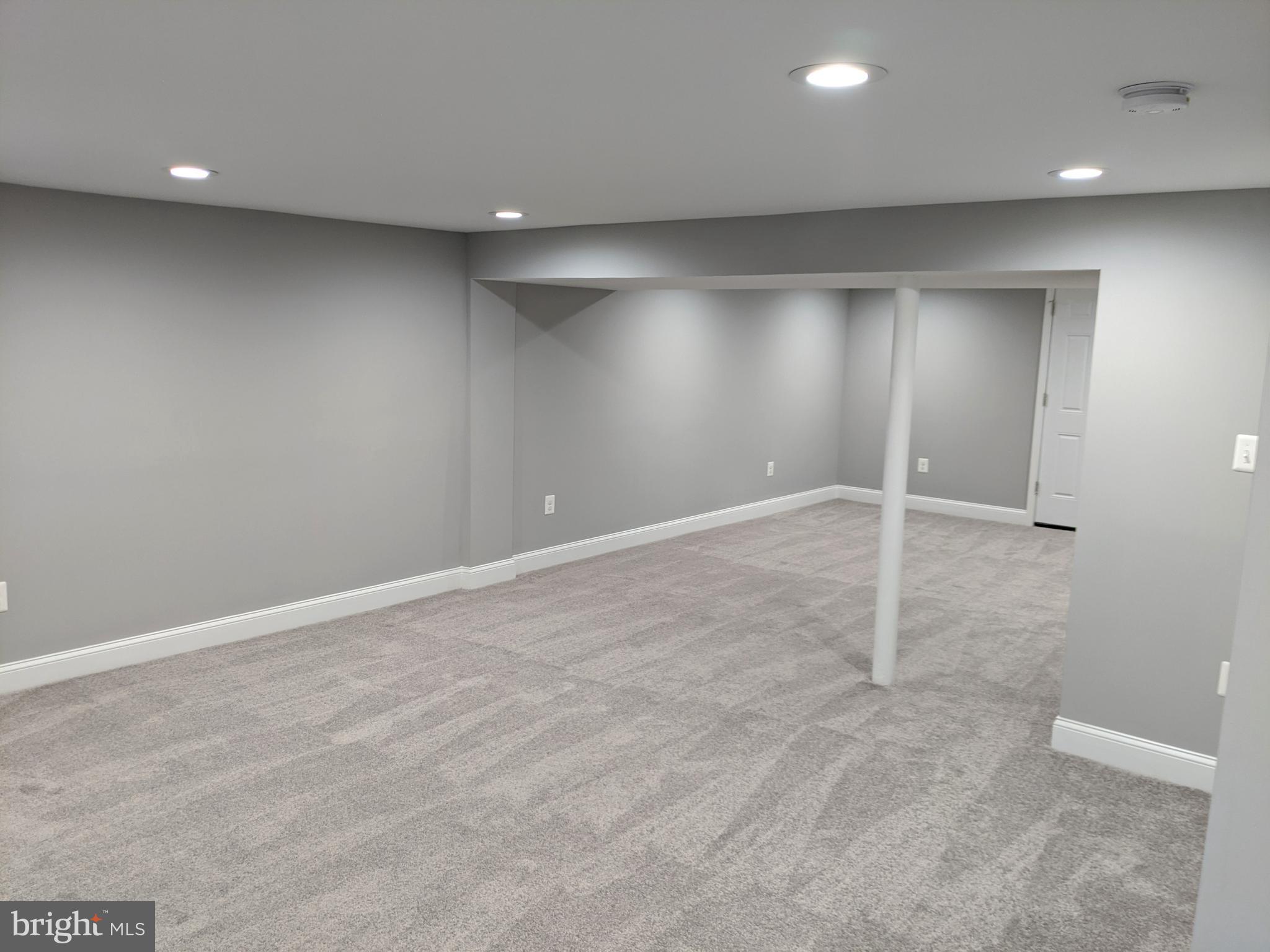 1216 East Cold Spring Lane Baltimore, MD 21239 - Photo 22 of 29 Huge Lower Level Family Room