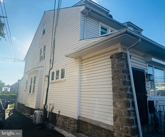 a view of a house with a white door