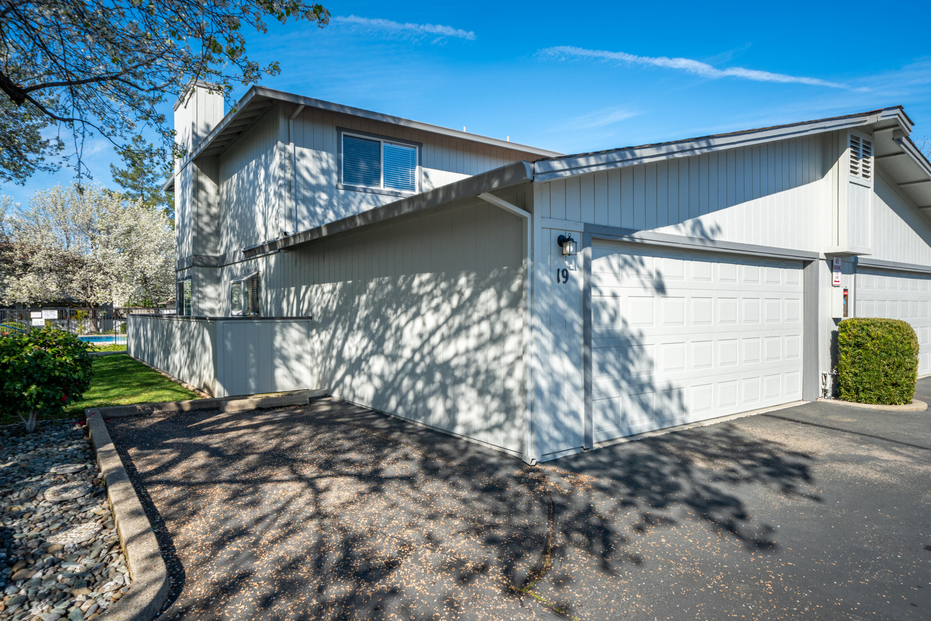 200 Ridgetop Drive, Unit 19 Redding, CA 96003 - Photo 1 of 53 a view of a house with a yard