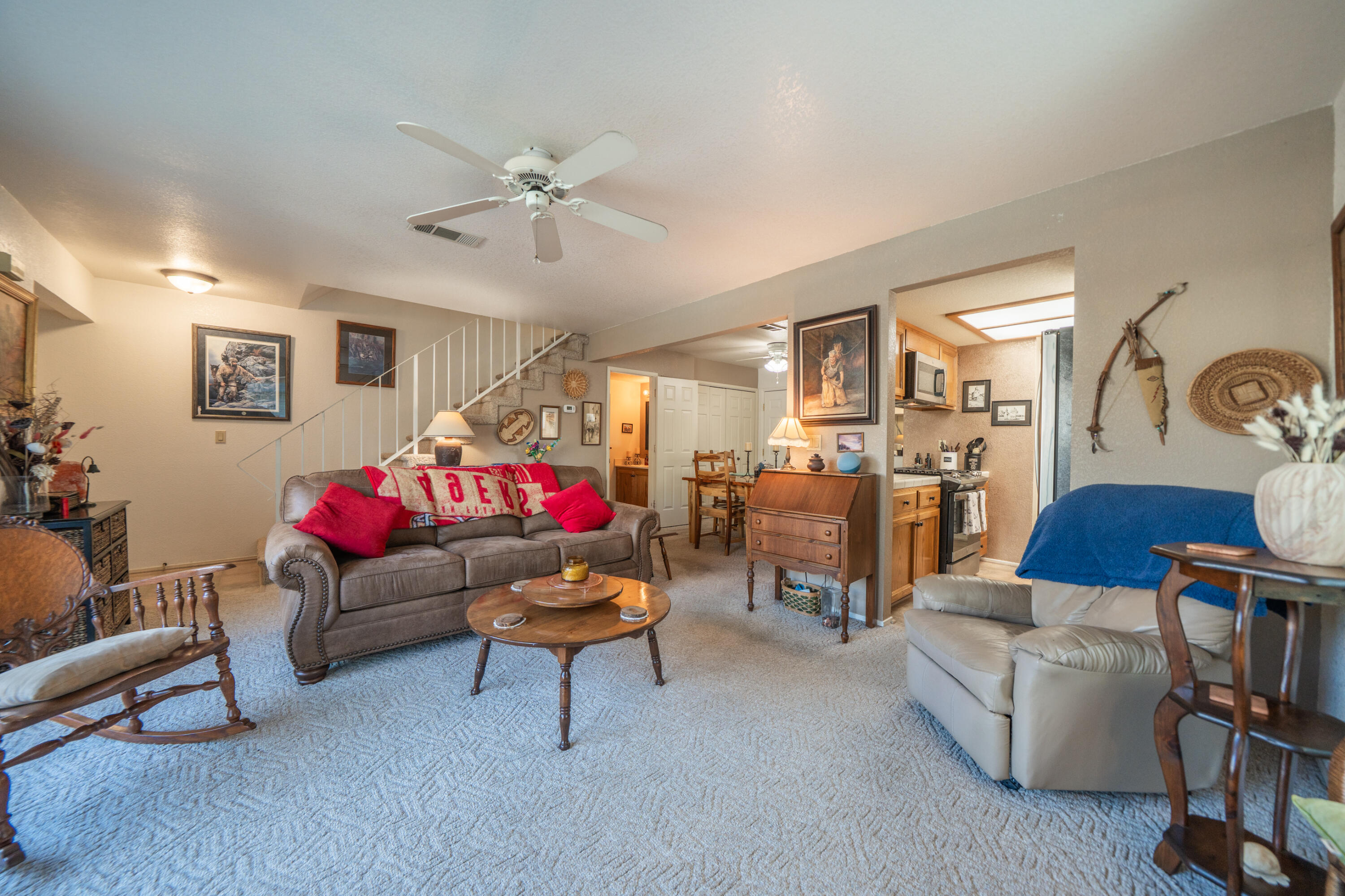 200 Ridgetop Drive, Unit 19 Redding, CA 96003 - Photo 14 of 53 a living room with furniture and a wooden floor