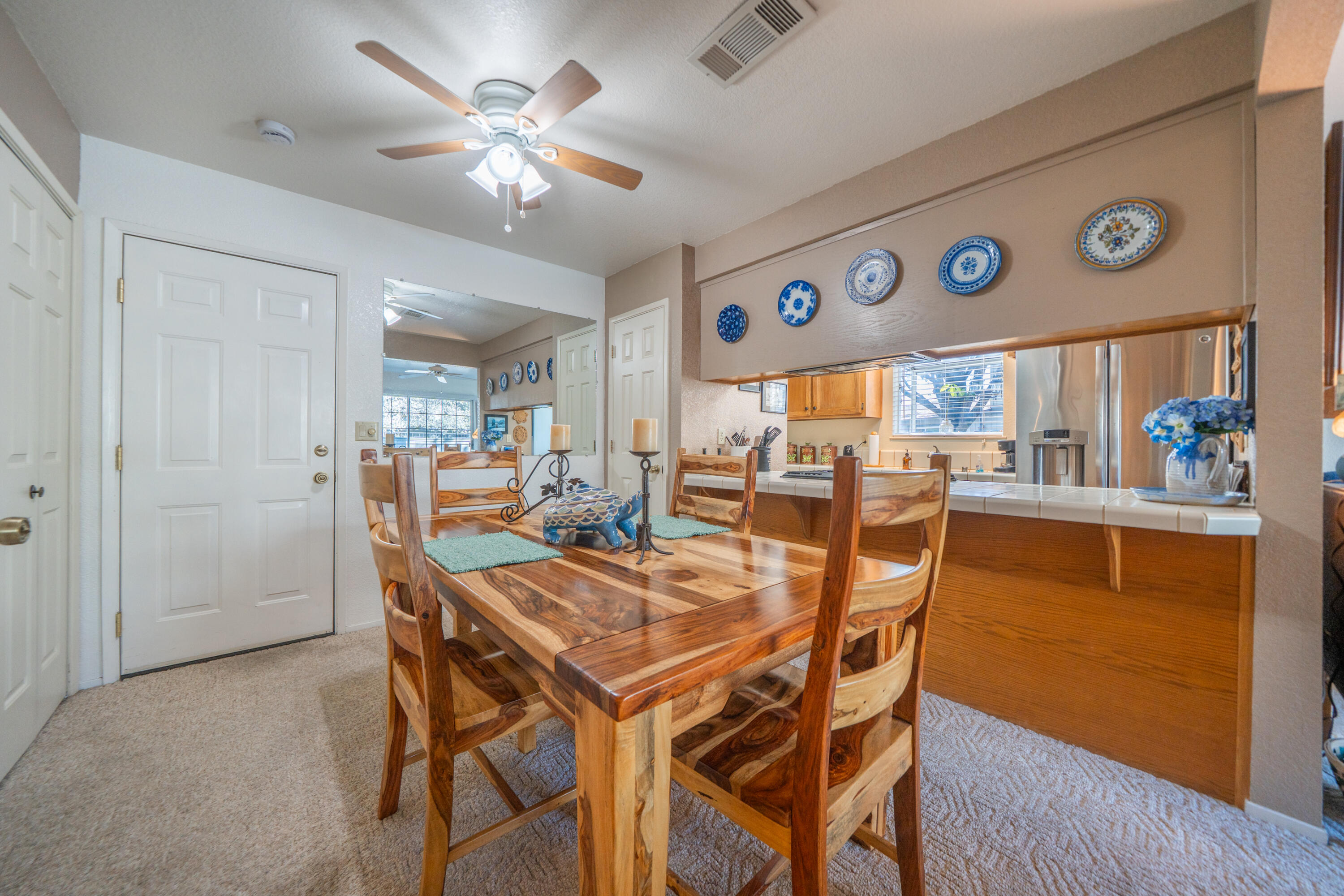 200 Ridgetop Drive, Unit 19 Redding, CA 96003 - Photo 16 of 53 a view of a dining room with furniture and chandelier