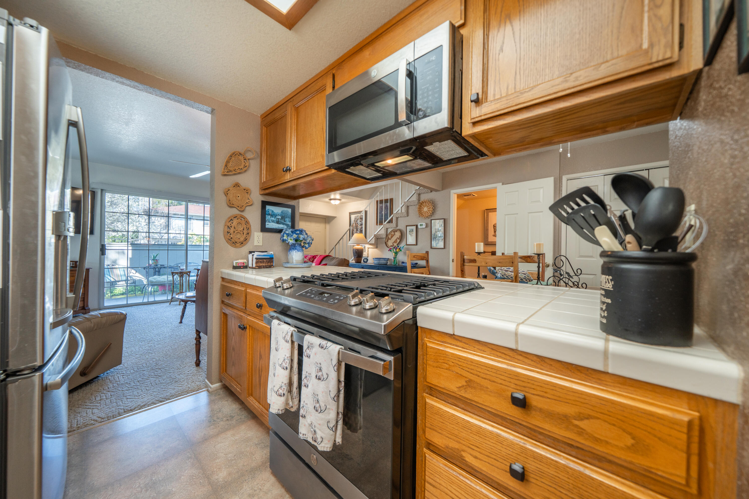 200 Ridgetop Drive, Unit 19 Redding, CA 96003 - Photo 20 of 53 a kitchen with stainless steel appliances granite countertop a stove and a sink