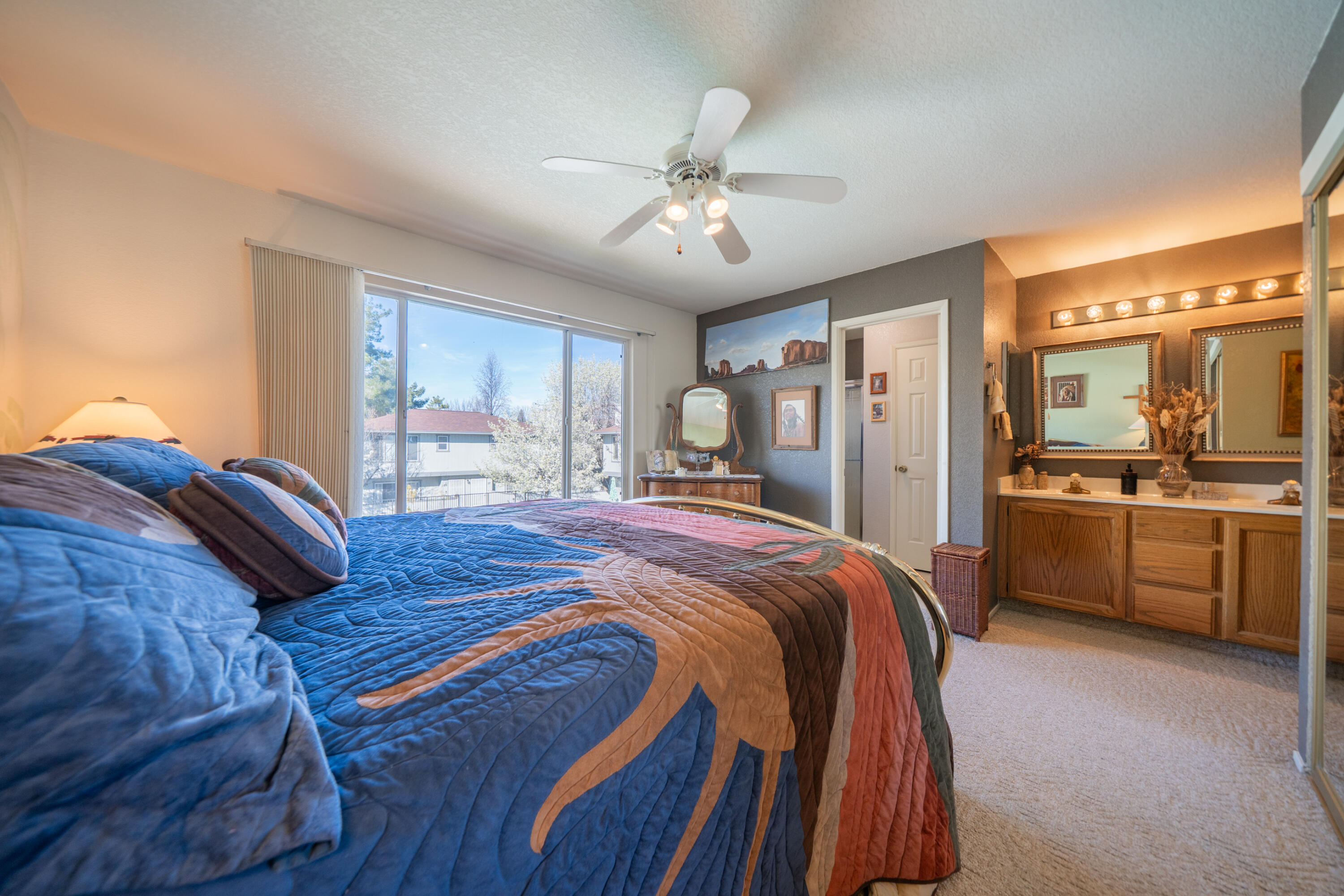 200 Ridgetop Drive, Unit 19 Redding, CA 96003 - Photo 24 of 53 a bed room with a bed and a dresser