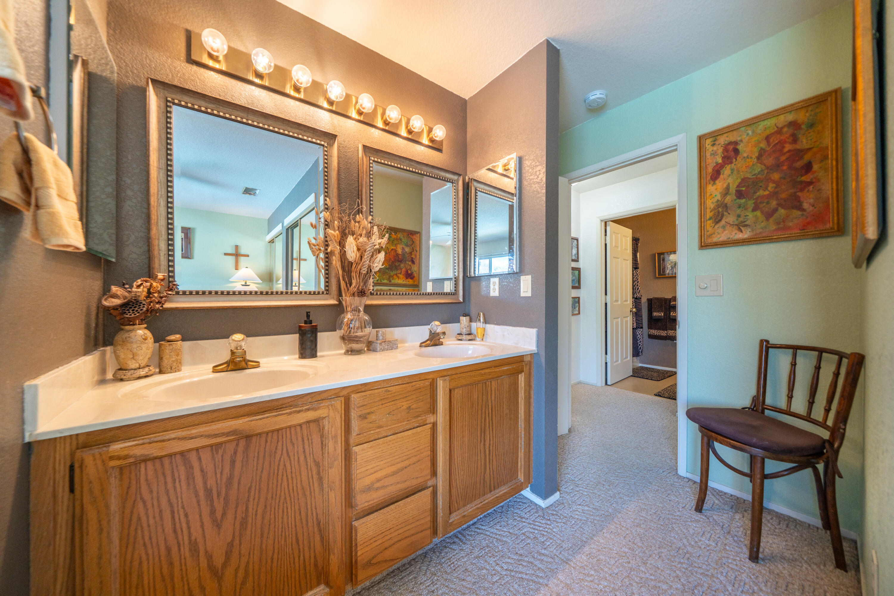 200 Ridgetop Drive, Unit 19 Redding, CA 96003 - Photo 25 of 53 a spacious bathroom with a double vanity sink a mirror and a bathtub