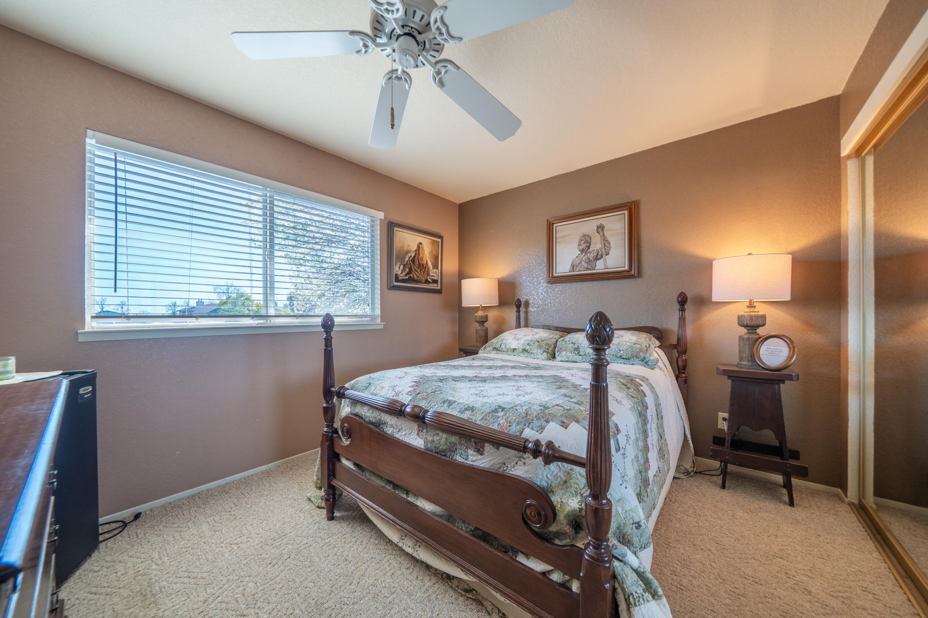 200 Ridgetop Drive, Unit 19 Redding, CA 96003 - Photo 27 of 53 a bed room with a bed and a window