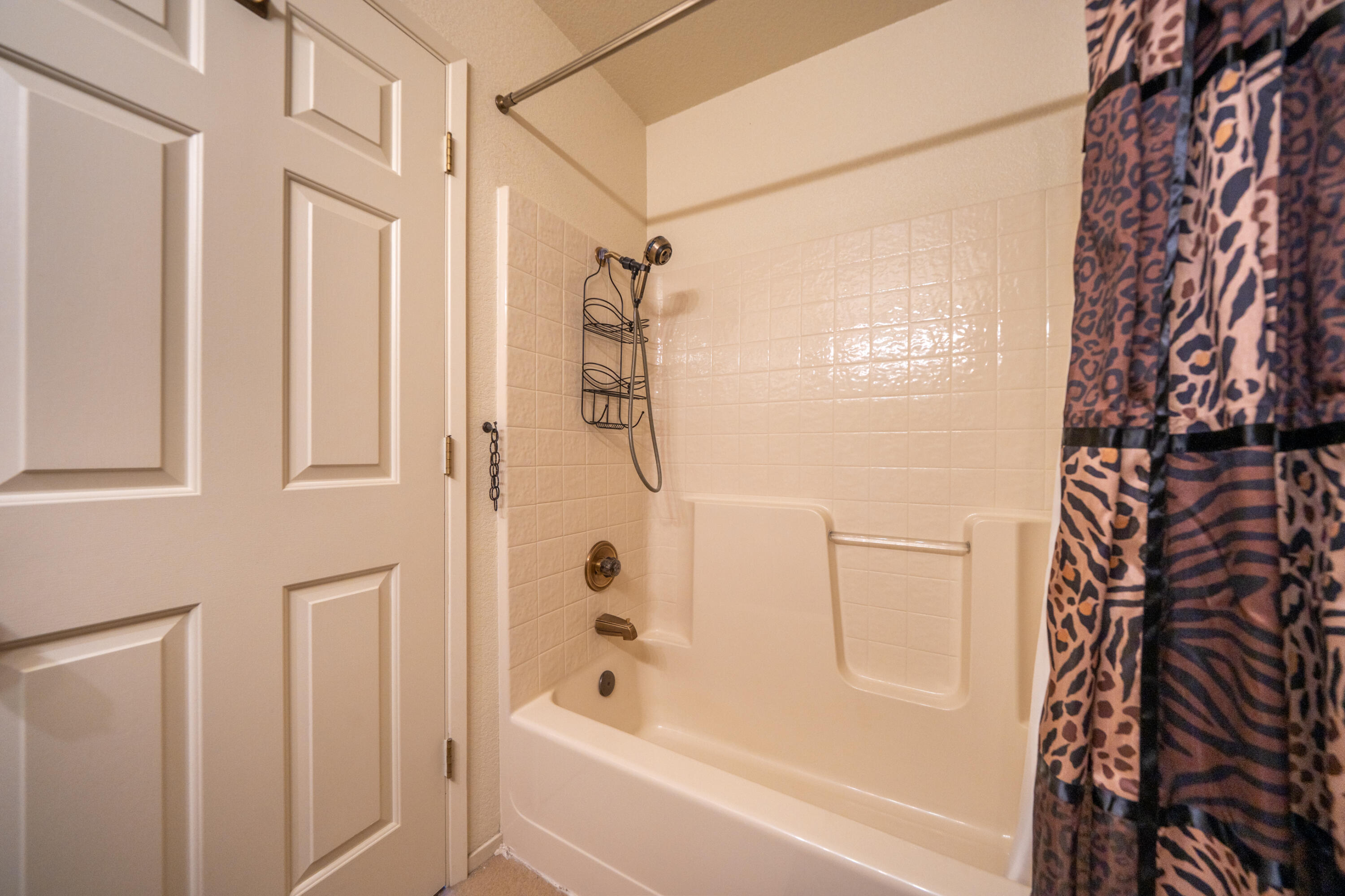 200 Ridgetop Drive, Unit 19 Redding, CA 96003 - Photo 30 of 53 a bathroom with a bathtub and a shower