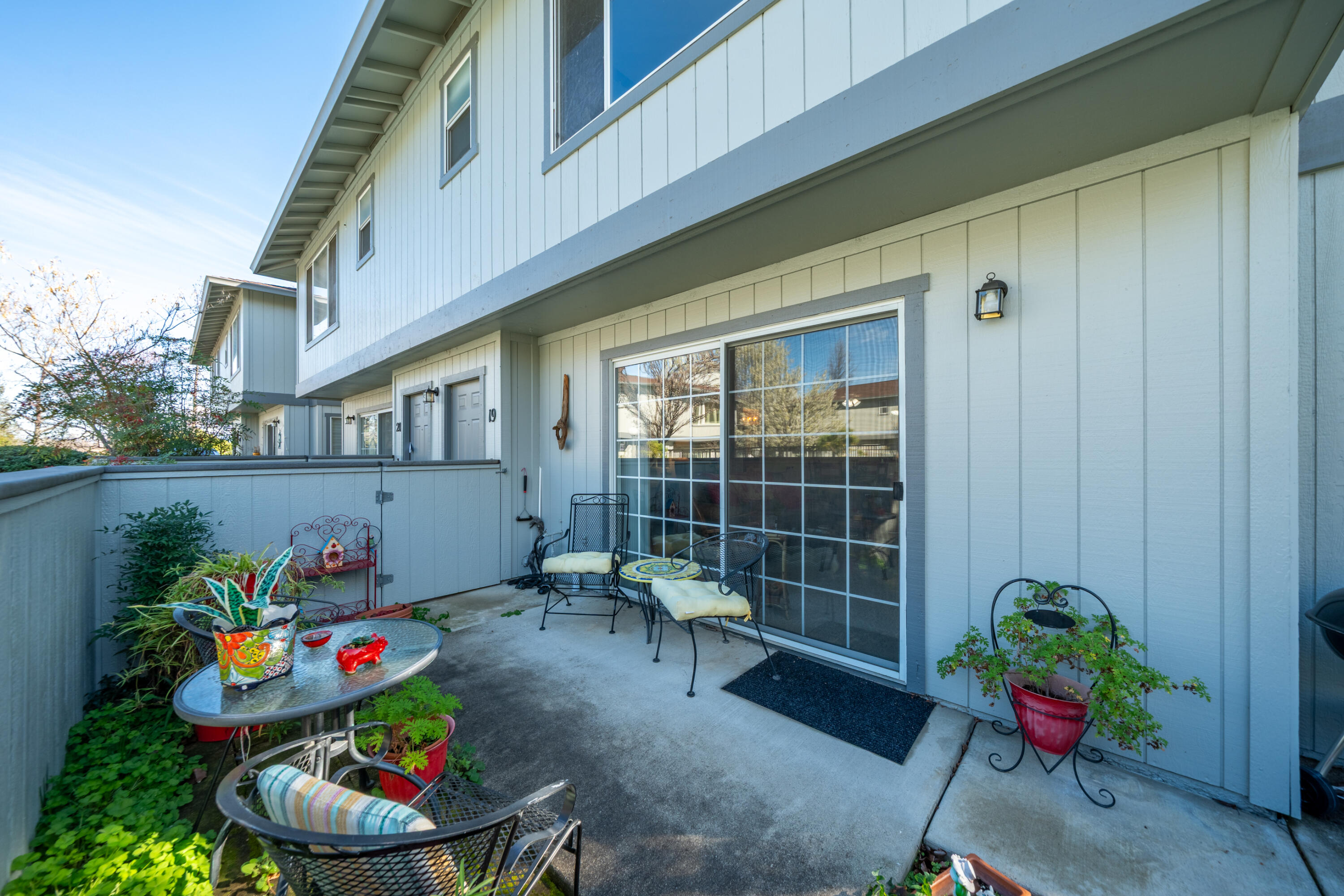 200 Ridgetop Drive, Unit 19 Redding, CA 96003 - Photo 33 of 53 a outdoor living space with furniture and flowers