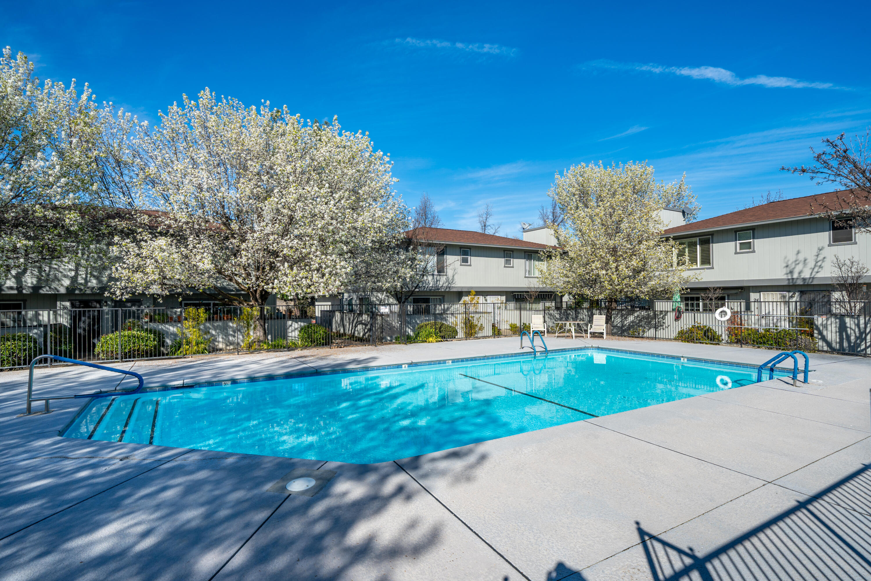 200 Ridgetop Drive, Unit 19 Redding, CA 96003 - Photo 35 of 53 a view of a swimming pool with a patio