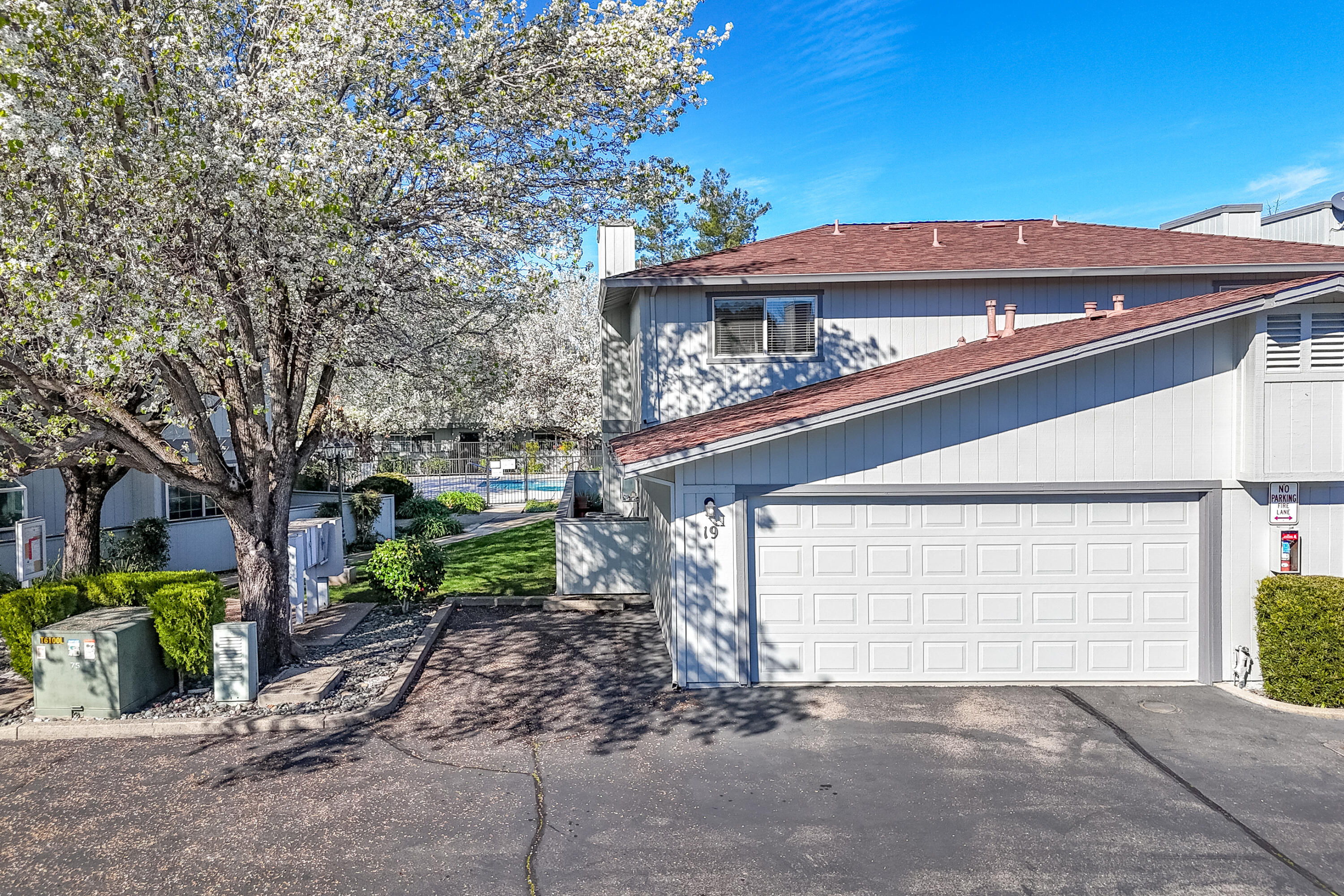 200 Ridgetop Drive, Unit 19 Redding, CA 96003 - Photo 39 of 53 a view of a house with a backyard