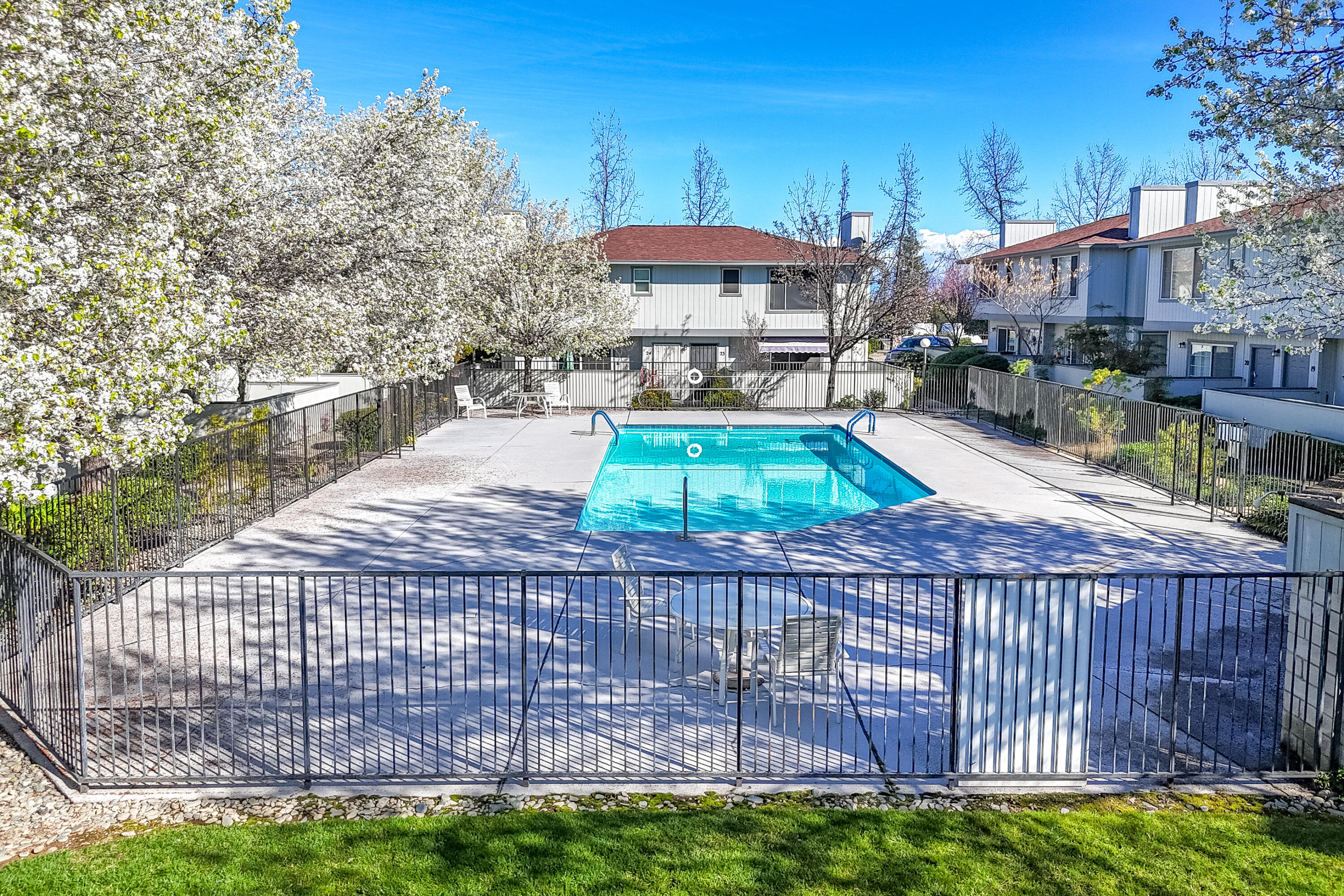 200 Ridgetop Drive, Unit 19 Redding, CA 96003 - Photo 41 of 53 a small pool with an outdoor seating