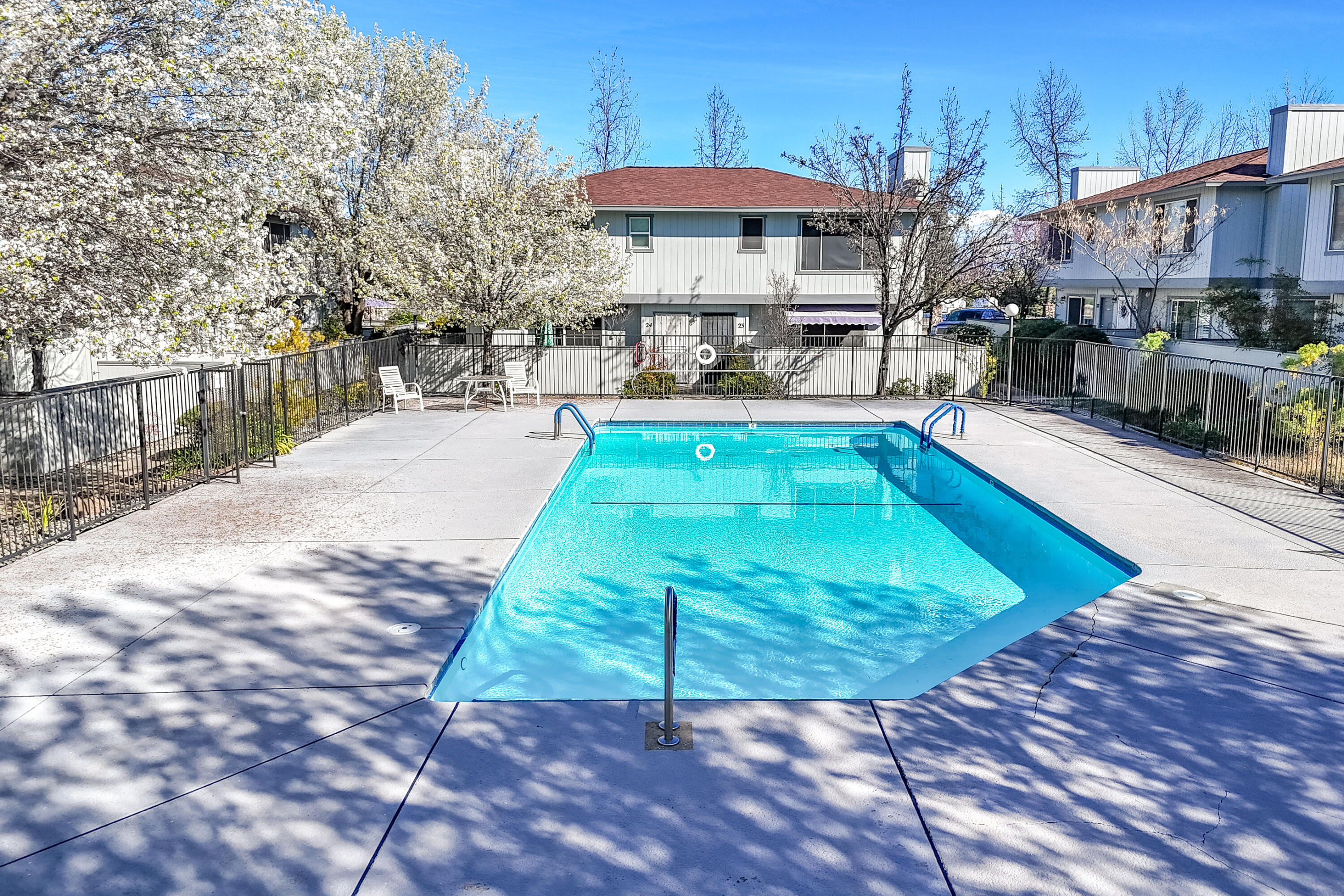 200 Ridgetop Drive, Unit 19 Redding, CA 96003 - Photo 43 of 53 a view of a swimming pool with a patio