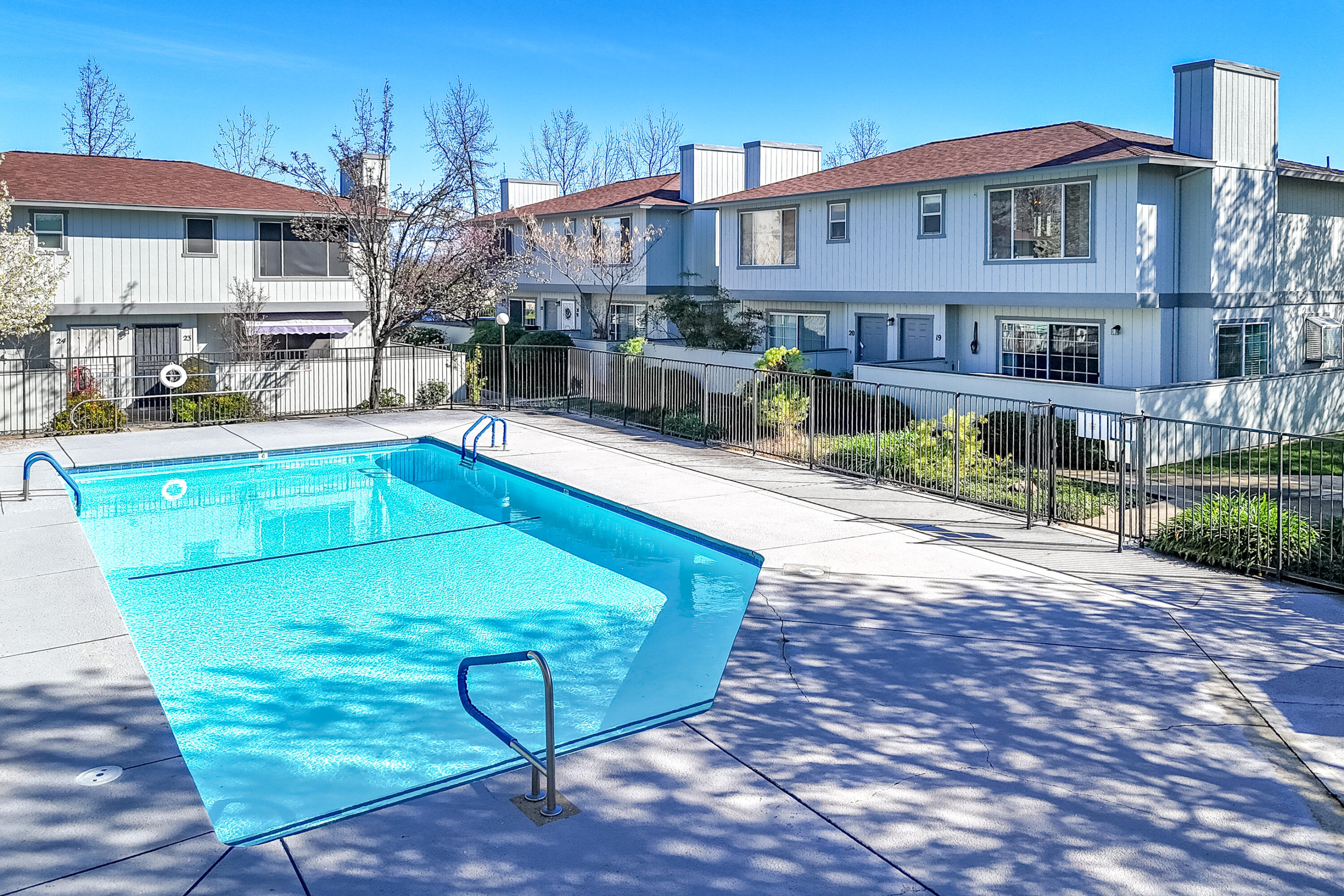 200 Ridgetop Drive, Unit 19 Redding, CA 96003 - Photo 44 of 53 a view of a house with pool and sitting area