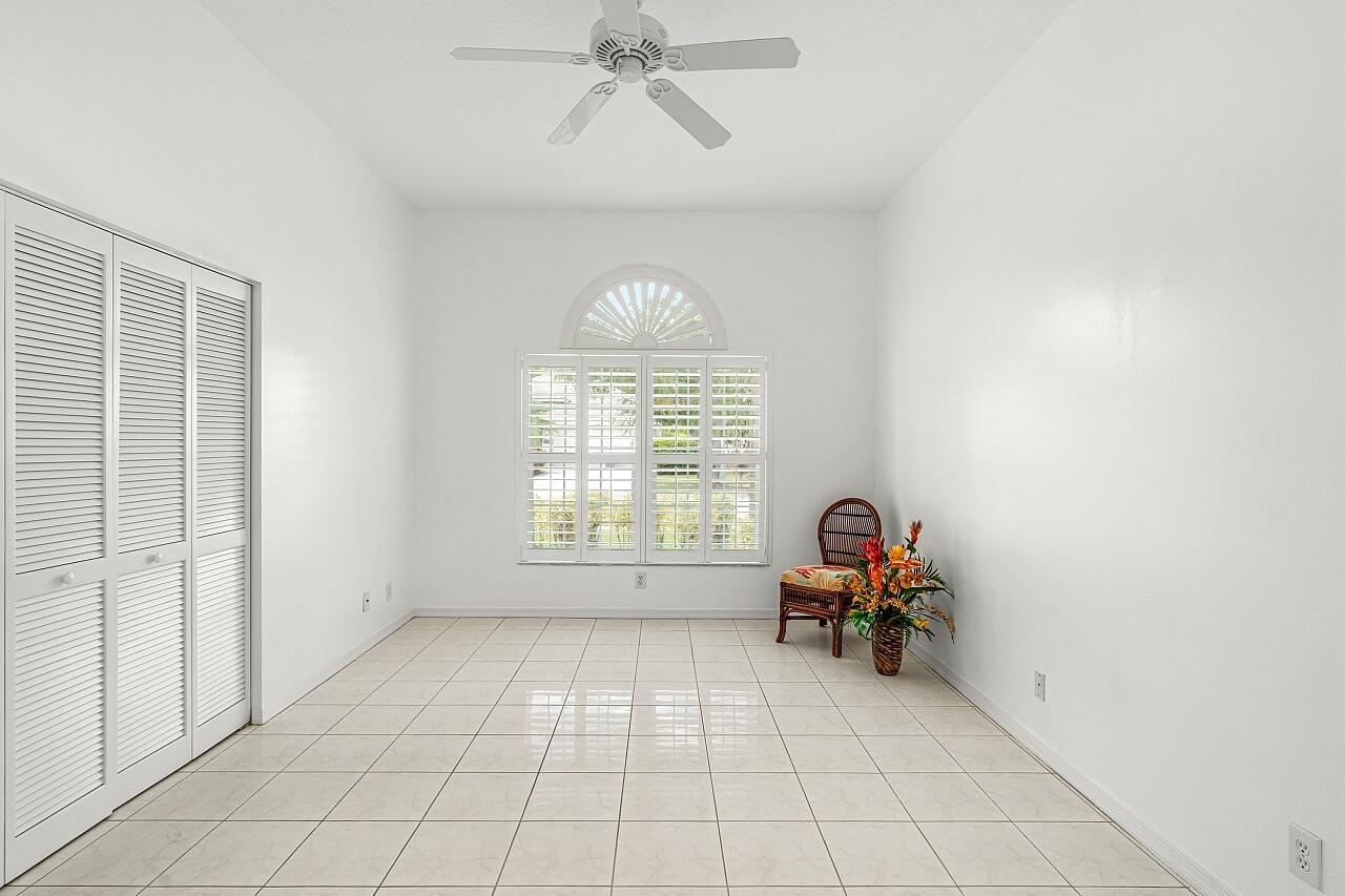 7313 Southeast Seagate Lane Stuart, FL 34997 - Photo 23 of 50 a view of room with workspace and windows