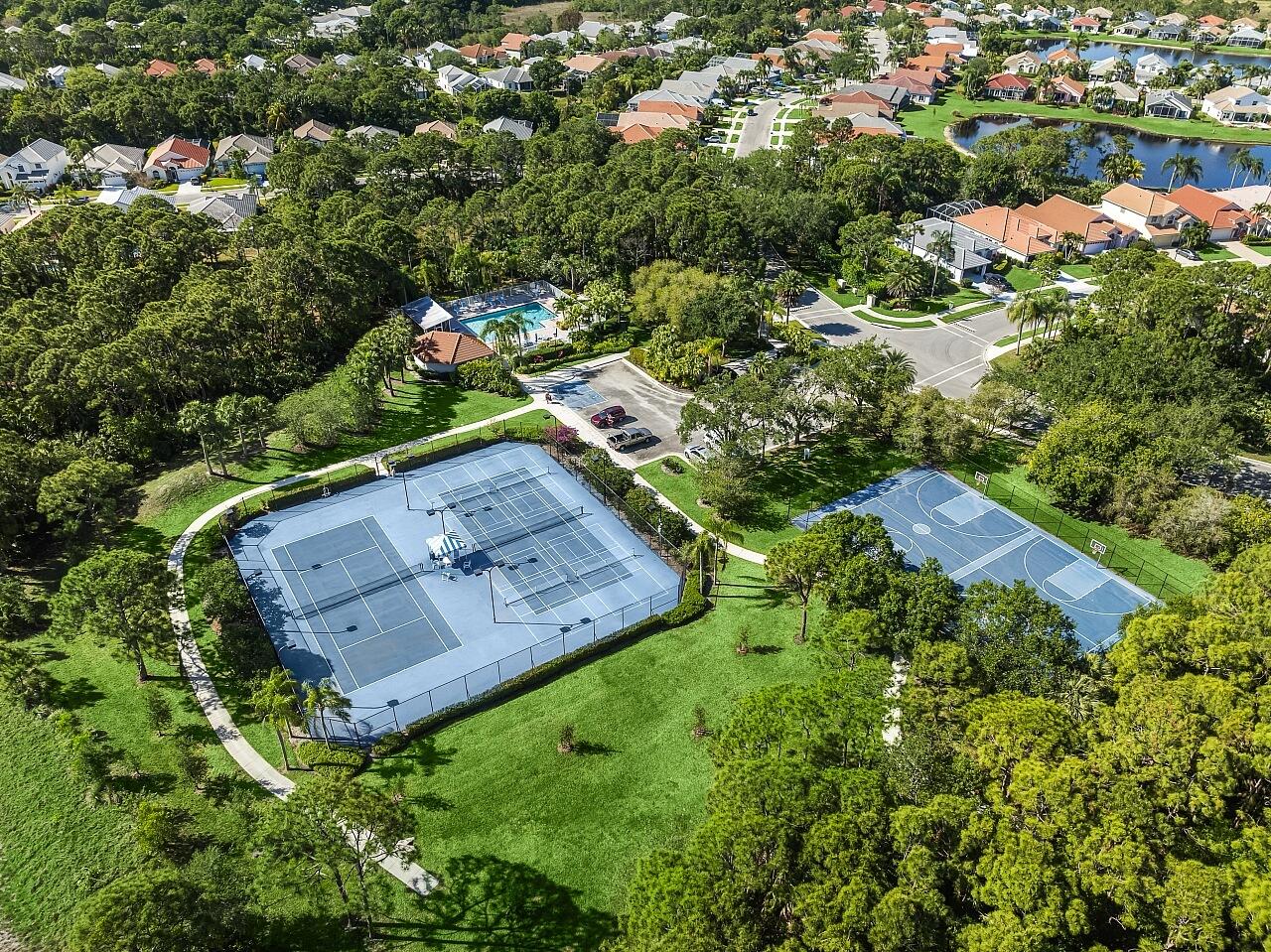 7313 Southeast Seagate Lane Stuart, FL 34997 - Photo 50 of 50 an aerial view of a yard