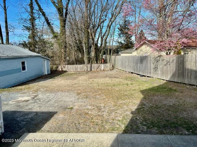 148 B West Sylvania Avenue, Unit B Neptune City, NJ 07753 - Photo 6 of 6 a backyard of a house