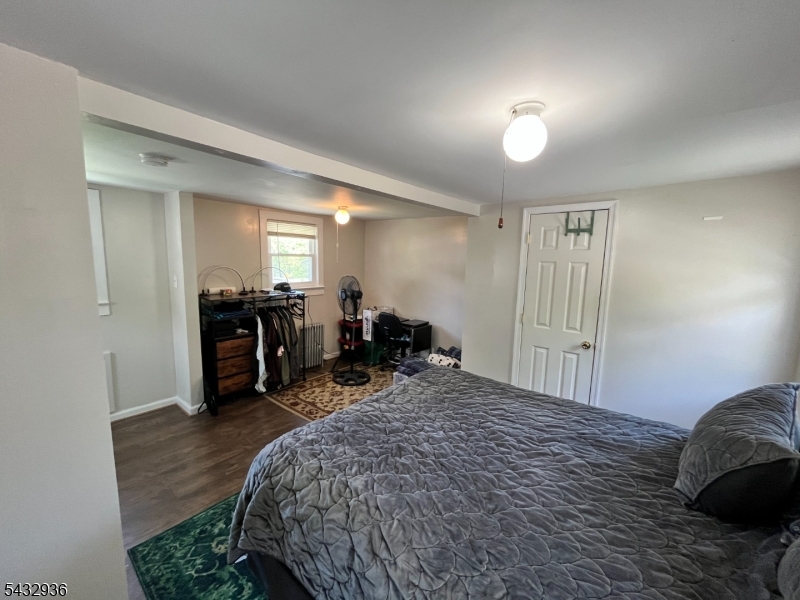 9 New Row Road, Unit A Hibernia, NJ 07842 - Photo 12 of 18 a bed room with a bed and furniture