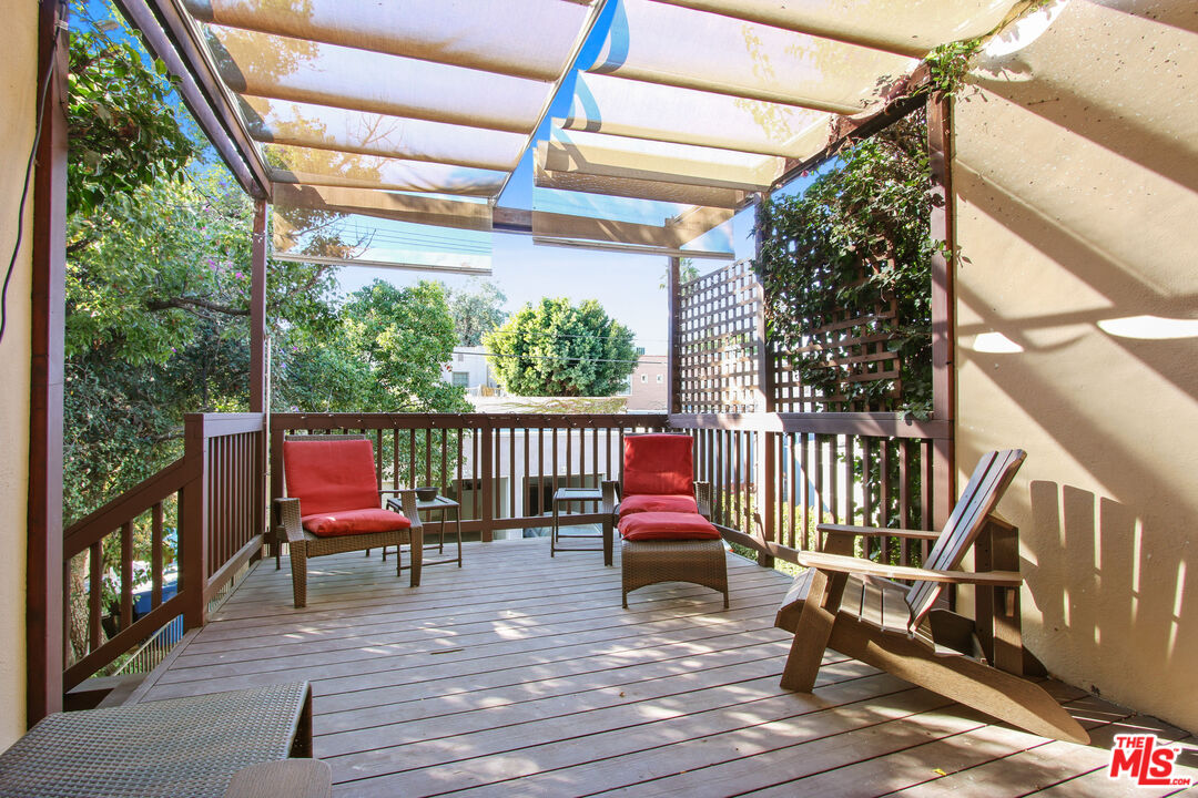 617 North Plymouth Boulevard, Unit 617 1/2 Los Angeles, CA 90004 - Photo 18 of 20 a view of a chairs on wooden deck