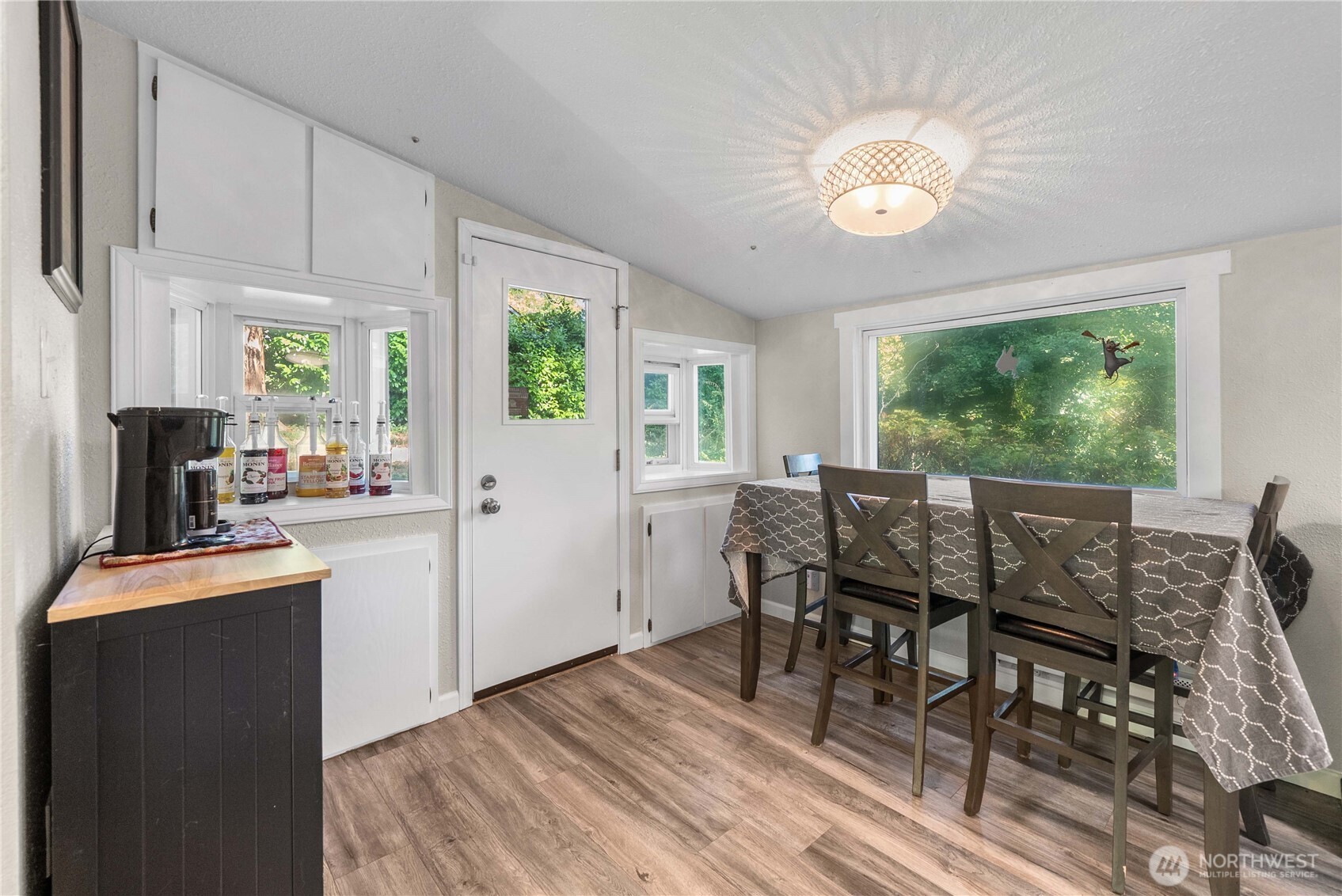 1251 South 230th Street Des Moines, WA 98198 - Photo 12 of 27 a view of a dining room with furniture window and outside view