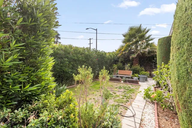 a view of a swimming pool with a garden