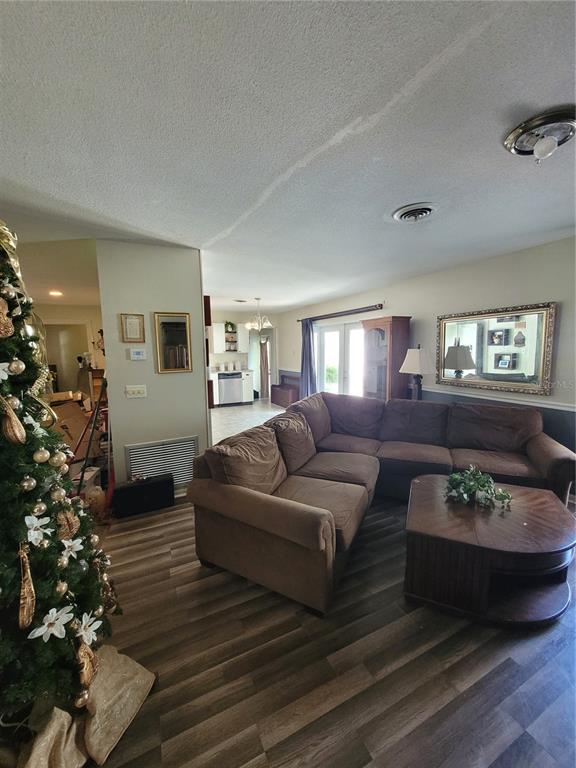 801 9th Street Northeast Fort Meade, FL 33841 - Photo 7 of 14 a living room with furniture plant and a window