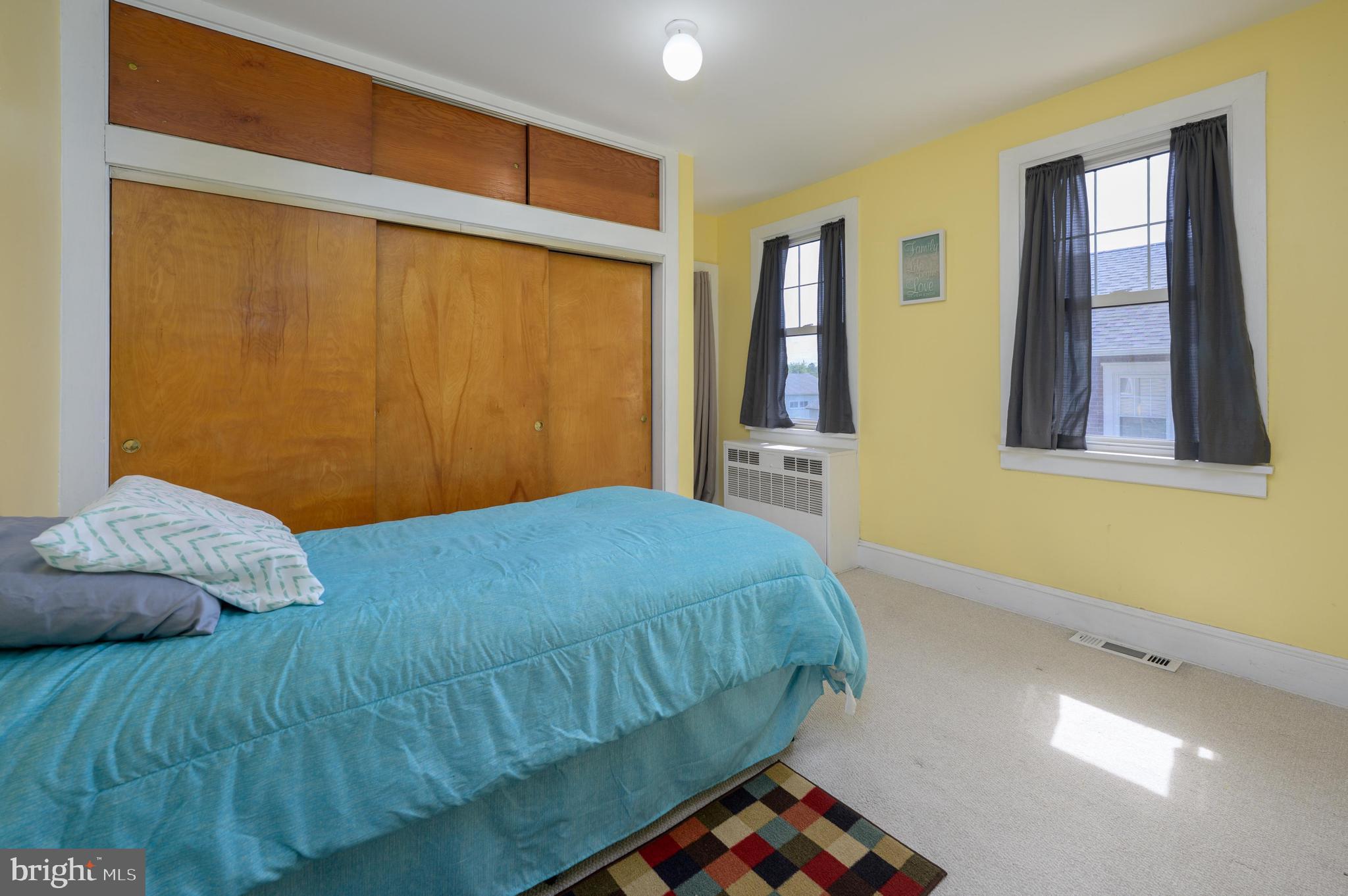 261 South Fellowship Road Maple Shade, NJ 08052 - Photo 16 of 30 a bedroom with a bed and wooden floor