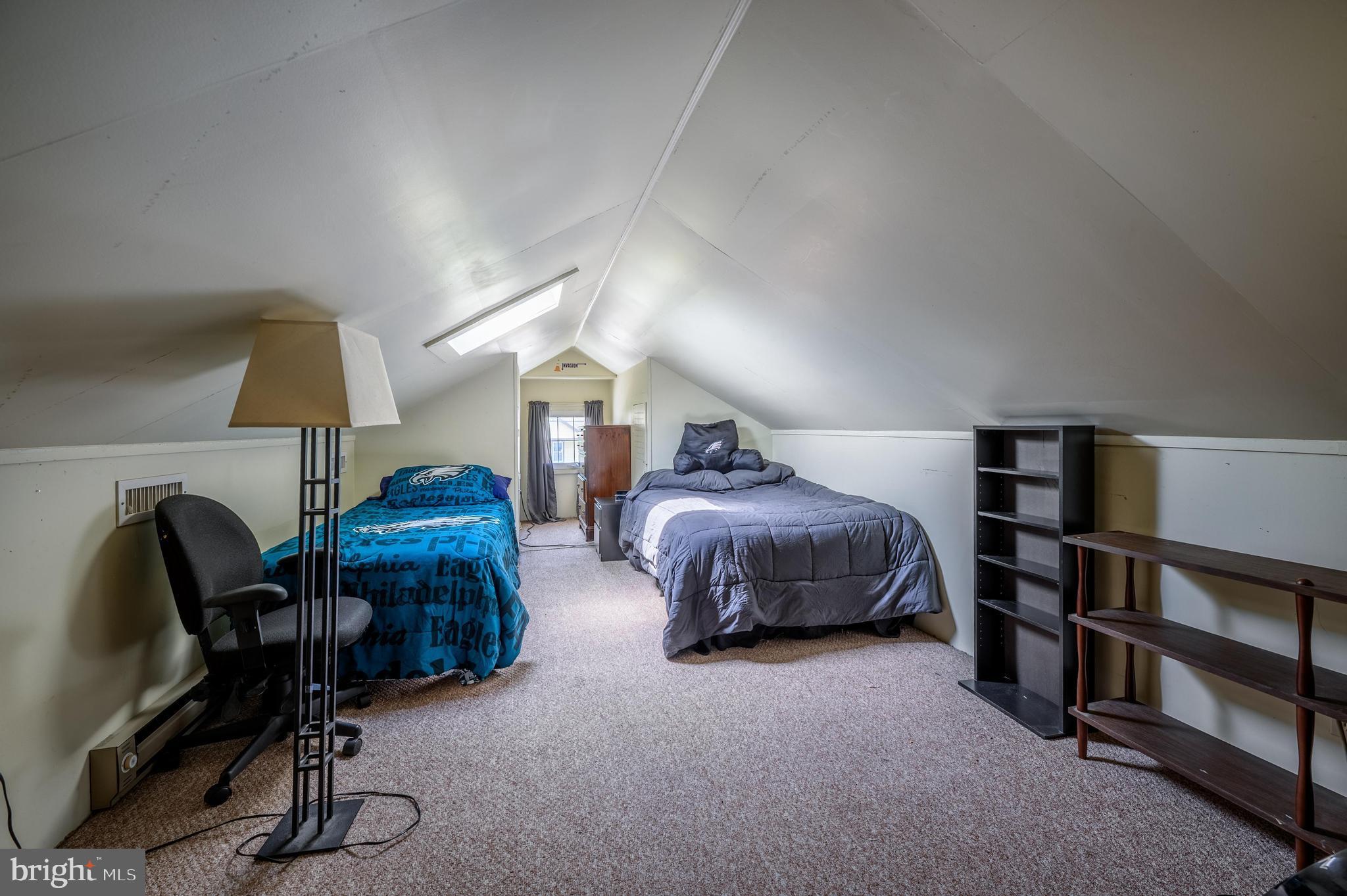 261 South Fellowship Road Maple Shade, NJ 08052 - Photo 18 of 30 a spacious bedroom with a bed a desk and chair