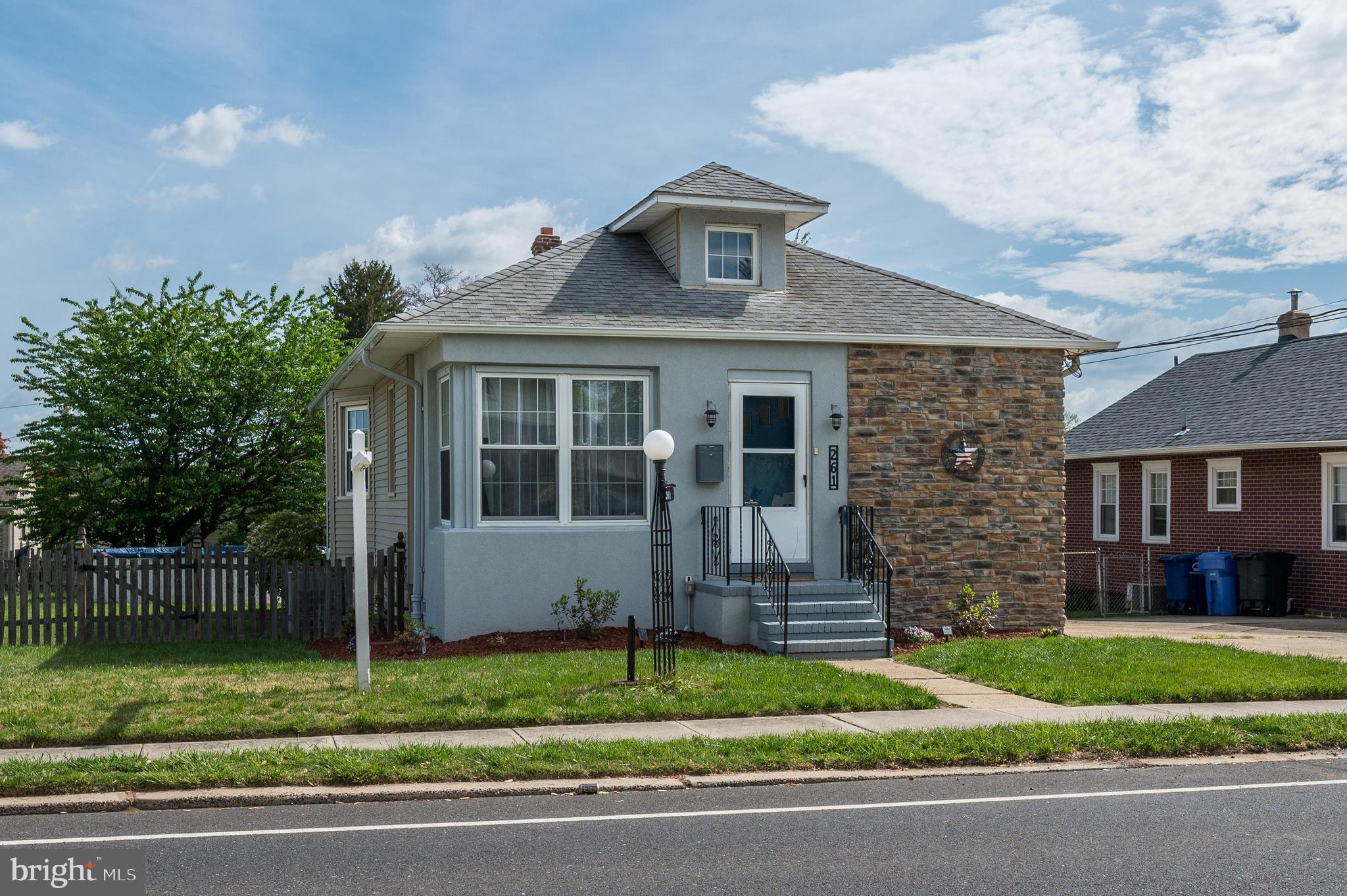 261 South Fellowship Road Maple Shade, NJ 08052 - Photo 23 of 30 a front view of a house with a garden