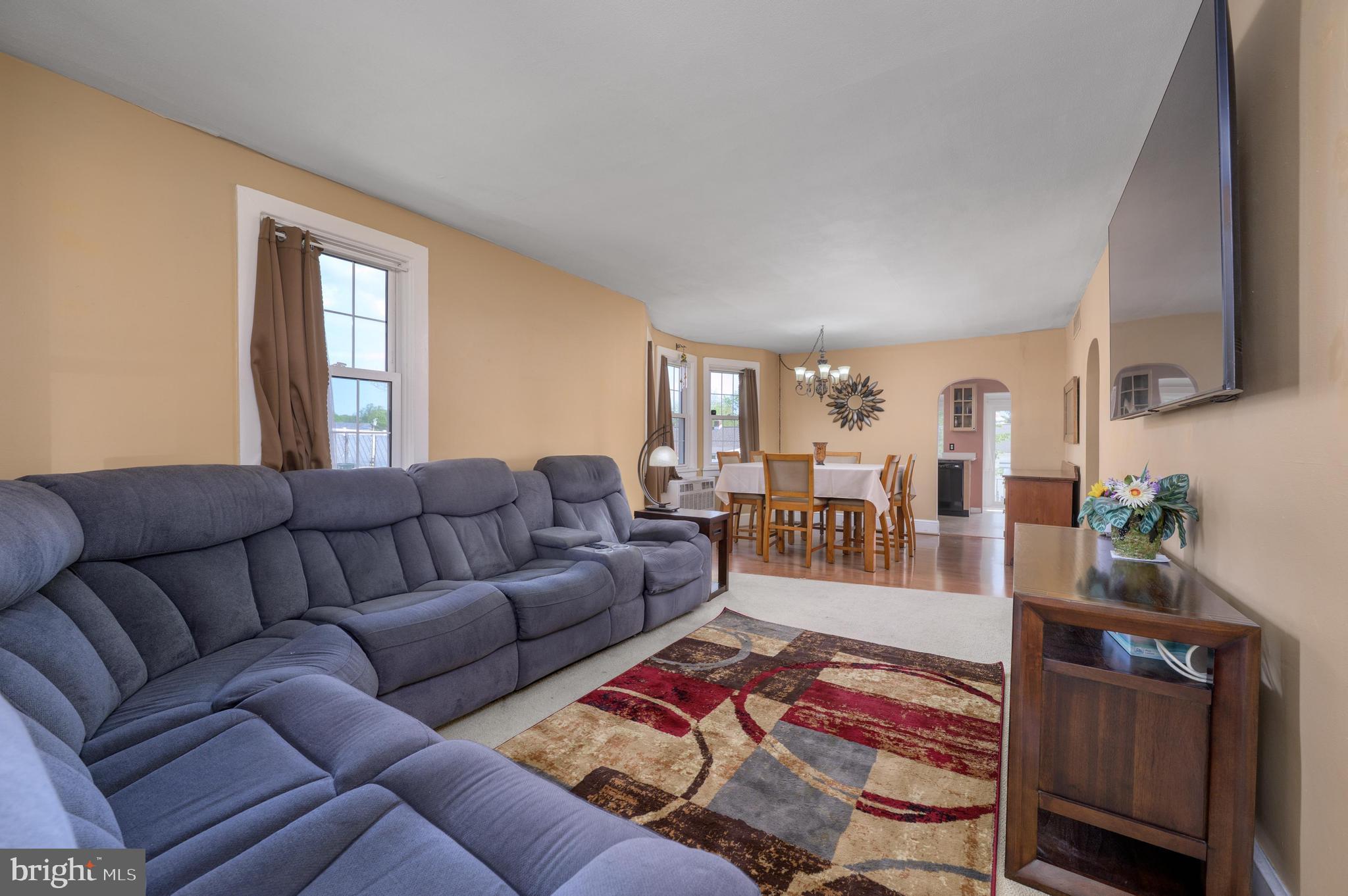 261 South Fellowship Road Maple Shade, NJ 08052 - Photo 5 of 30 a living room with furniture wooden floor and a flat screen tv
