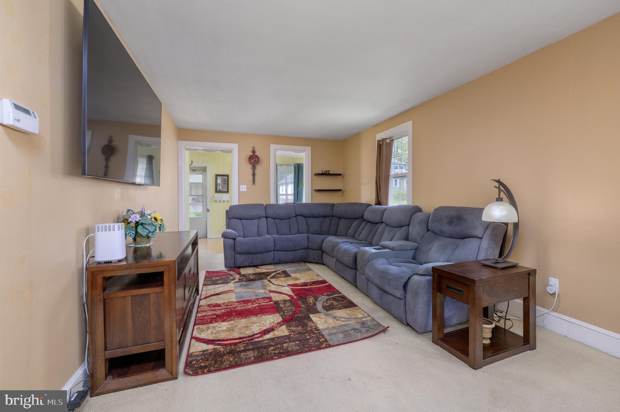 261 South Fellowship Road Maple Shade, NJ 08052 - Photo 6 of 30 a living room with furniture and a rug