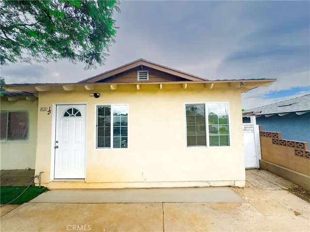 a view of a house with a swimming pool