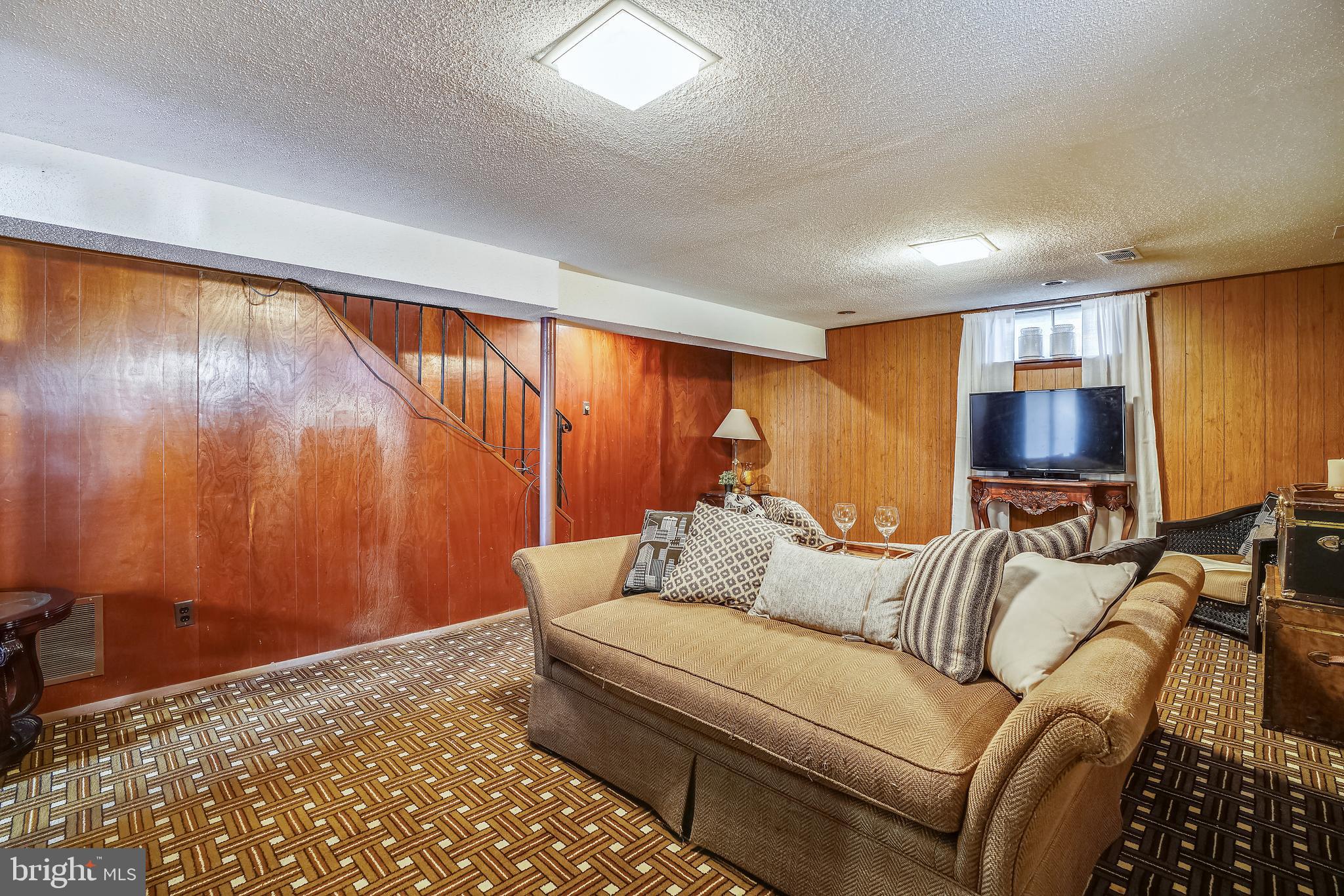 8233 Scotts Level Road Baltimore, MD 21208 - Photo 28 of 37 a living room with furniture