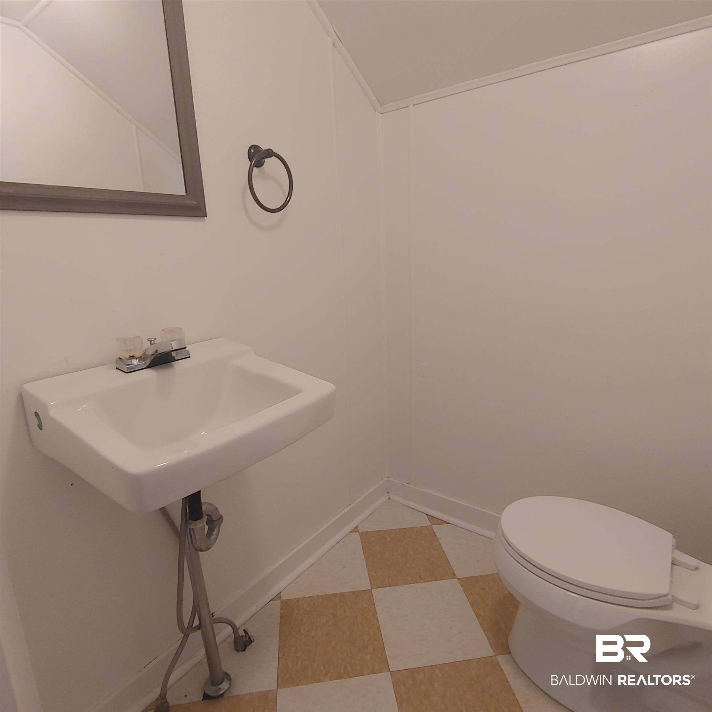 770 Arena Road Frisco City, AL 36445 - Photo 38 of 51 Bathroom featuring tile patterned floors and toilet