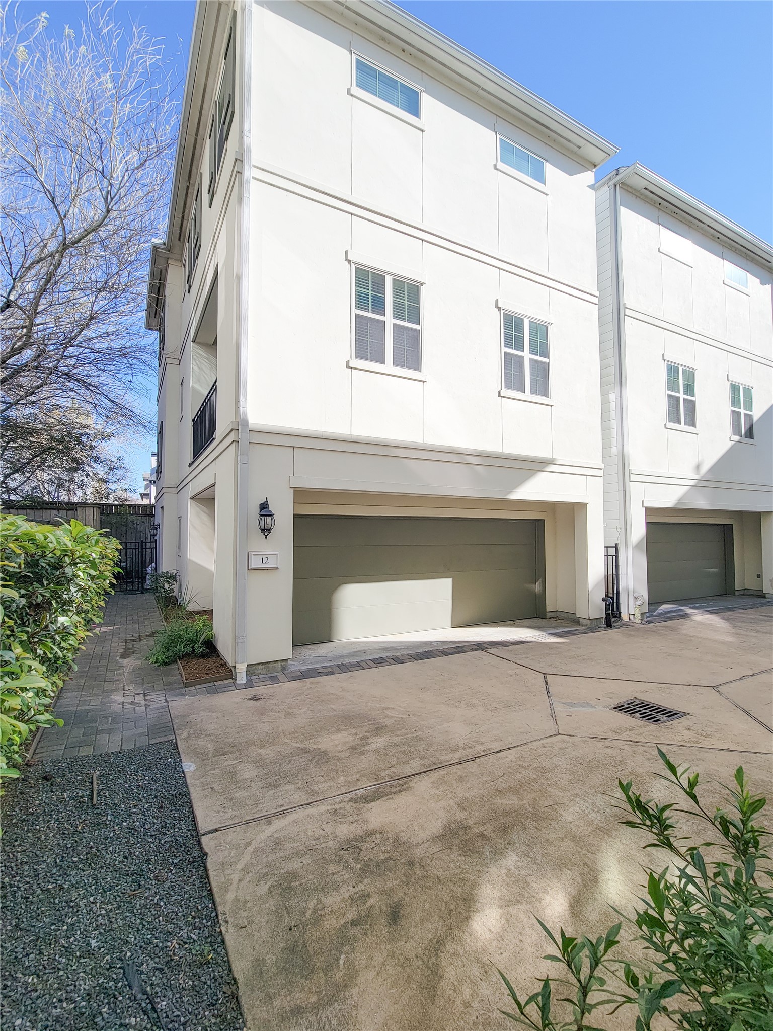 a view of a house with a street