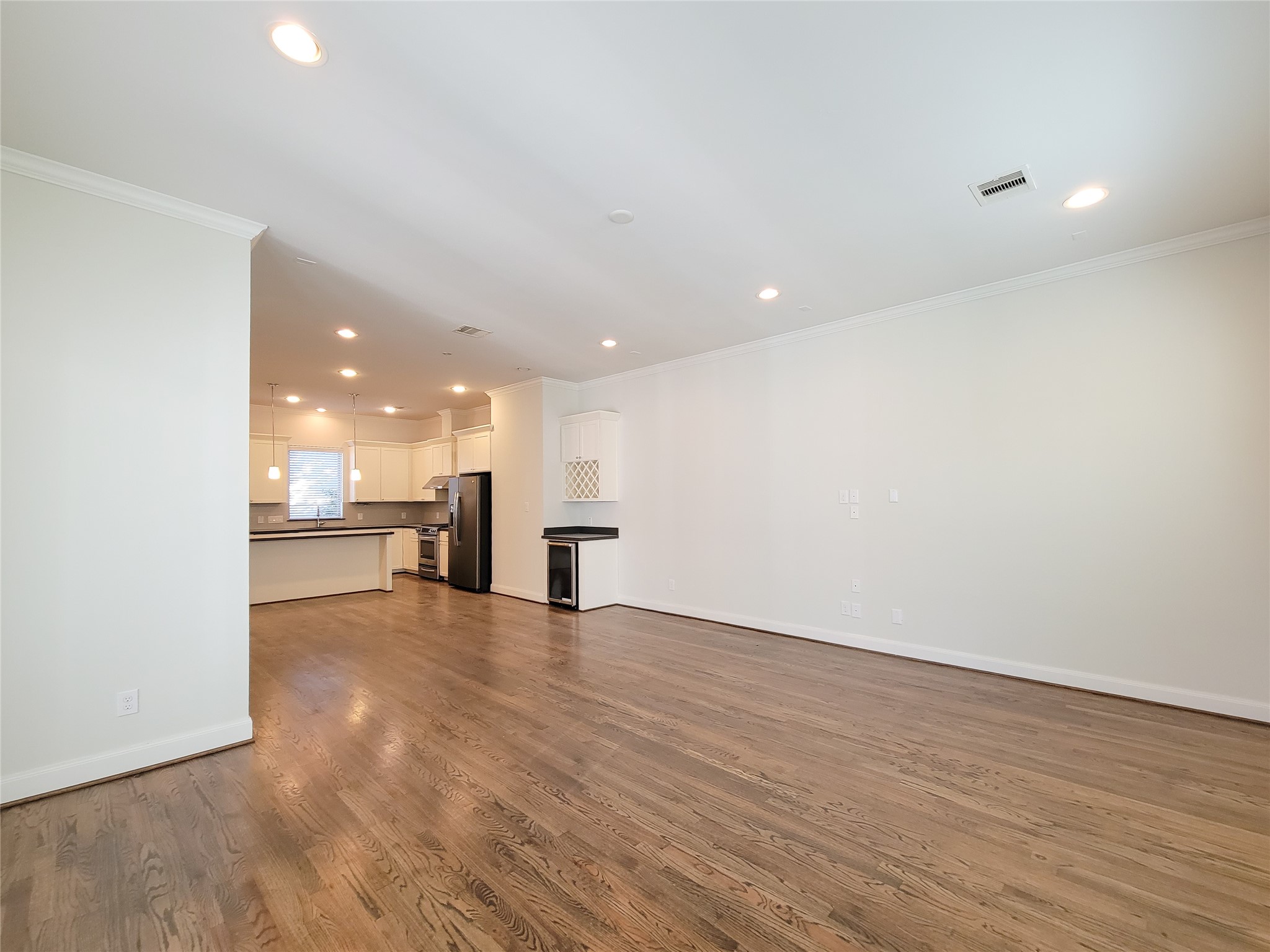 12 Hermann Park Court Houston, TX 77021 - Photo 21 of 43 a view of a kitchen with a sink and a floor to ceiling window