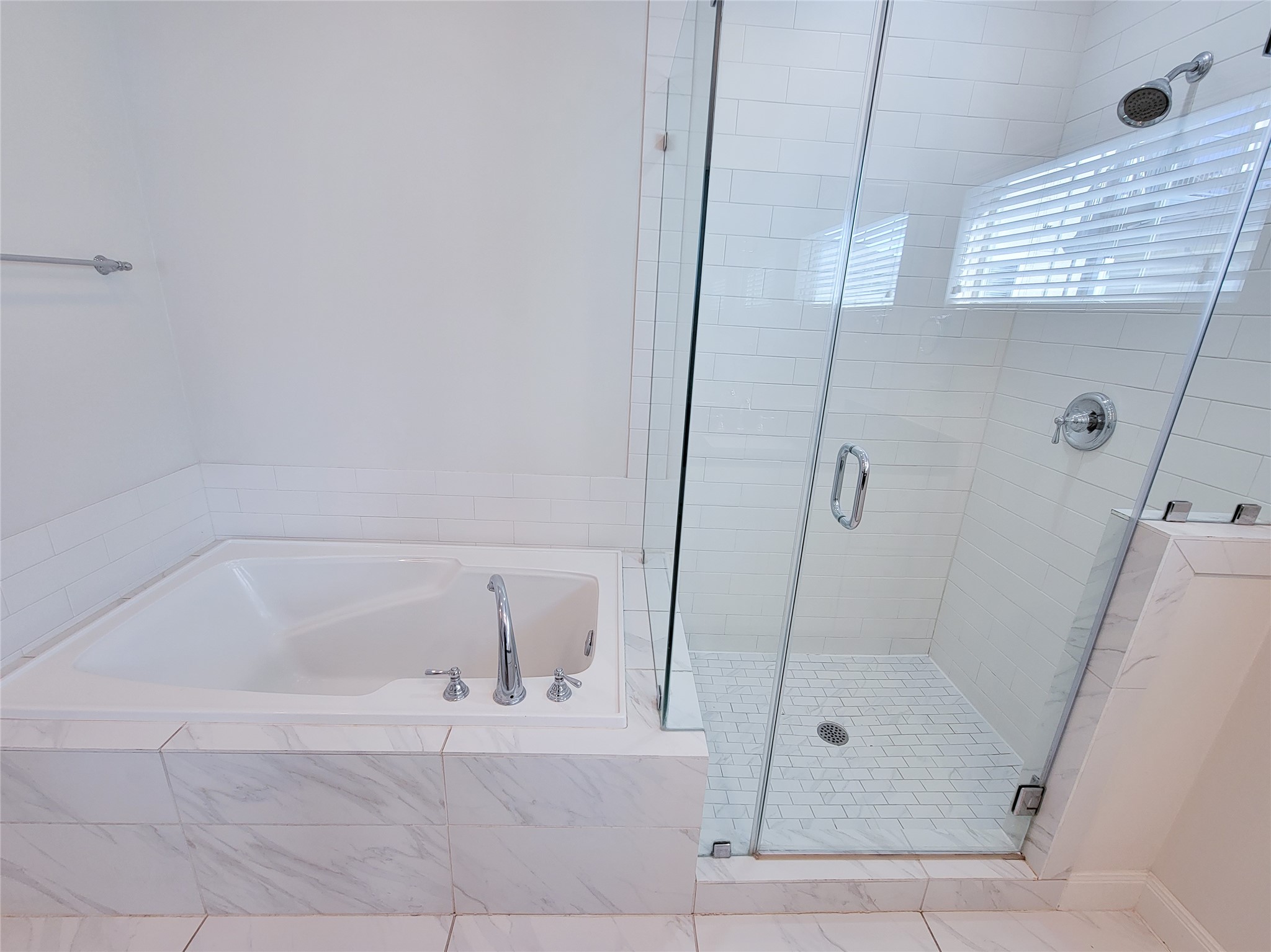 12 Hermann Park Court Houston, TX 77021 - Photo 30 of 43 a bathroom with a tub and shower