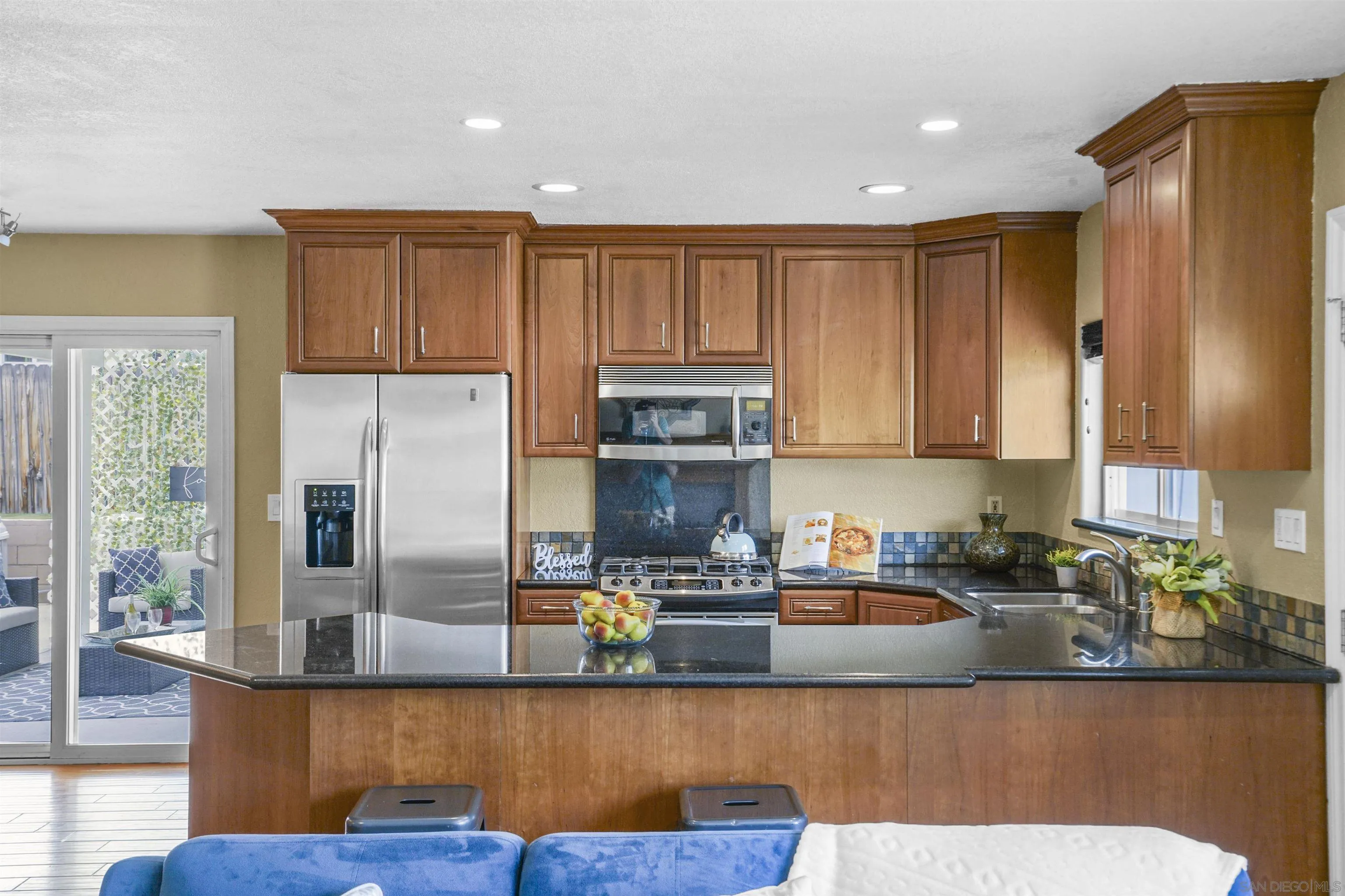 10111 White Pine Lane Santee, CA 92071 - Photo 15 of 35 a kitchen with stainless steel appliances granite countertop a refrigerator a stove and a cabinets