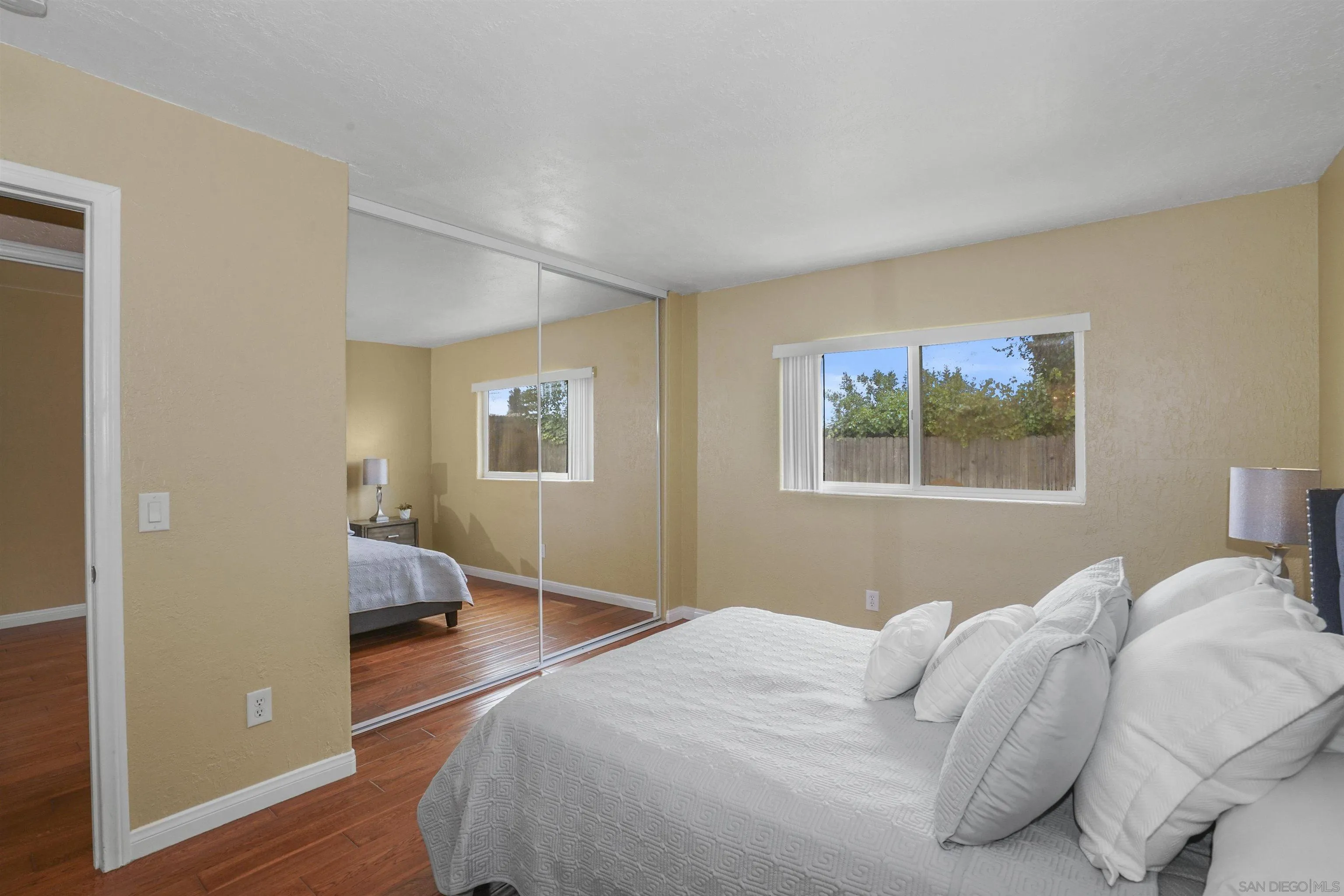 10111 White Pine Lane Santee, CA 92071 - Photo 18 of 35 a bedroom with a bed and a window