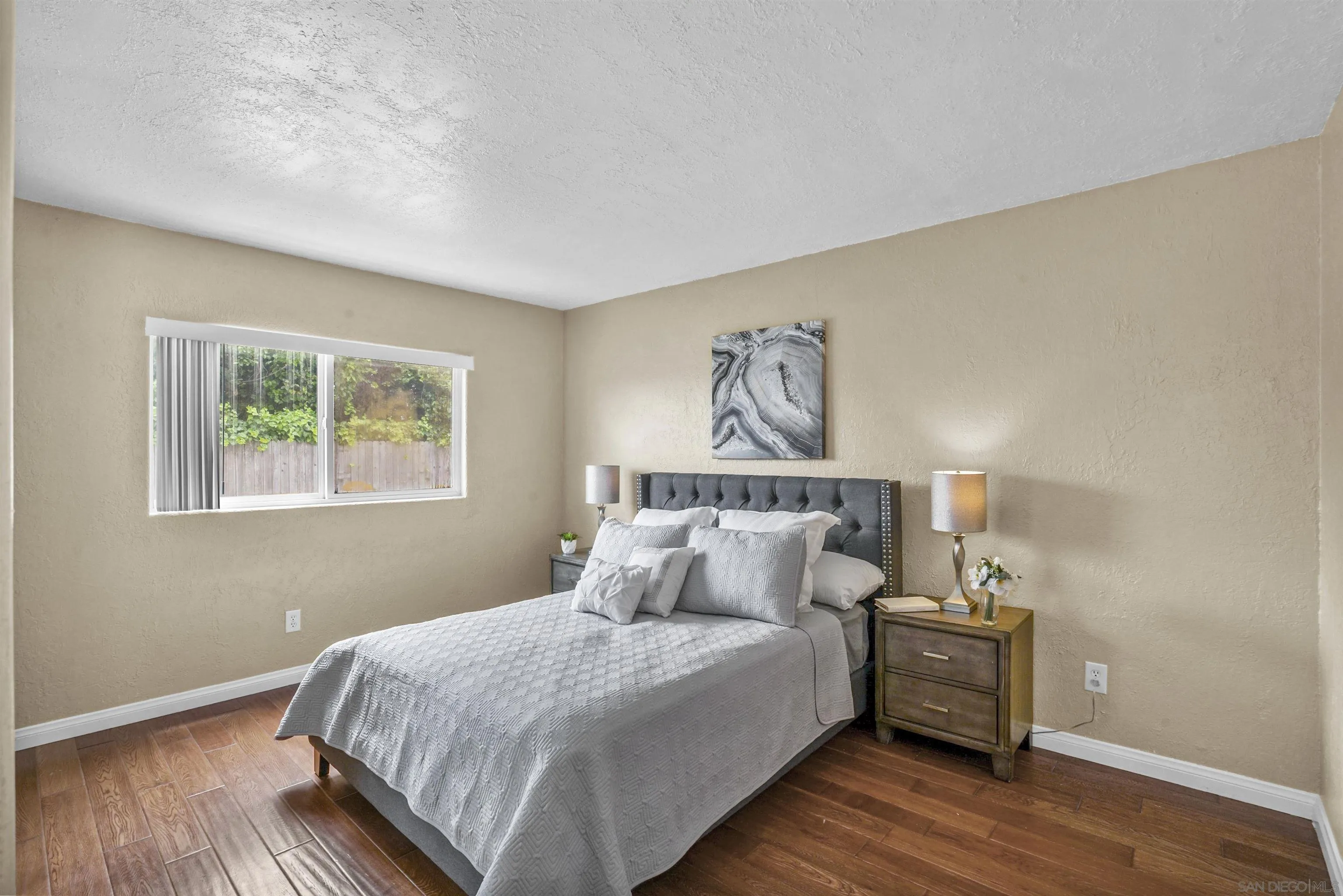 10111 White Pine Lane Santee, CA 92071 - Photo 21 of 35 a bedroom with a bed and a window